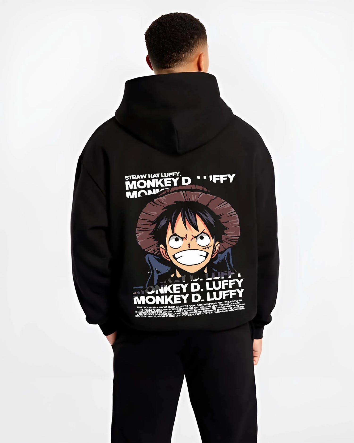 Black hoodie worn by male model, back view with Monkey D Luffy Hoodie One Piece Pirate King graphic bold anime graphic.