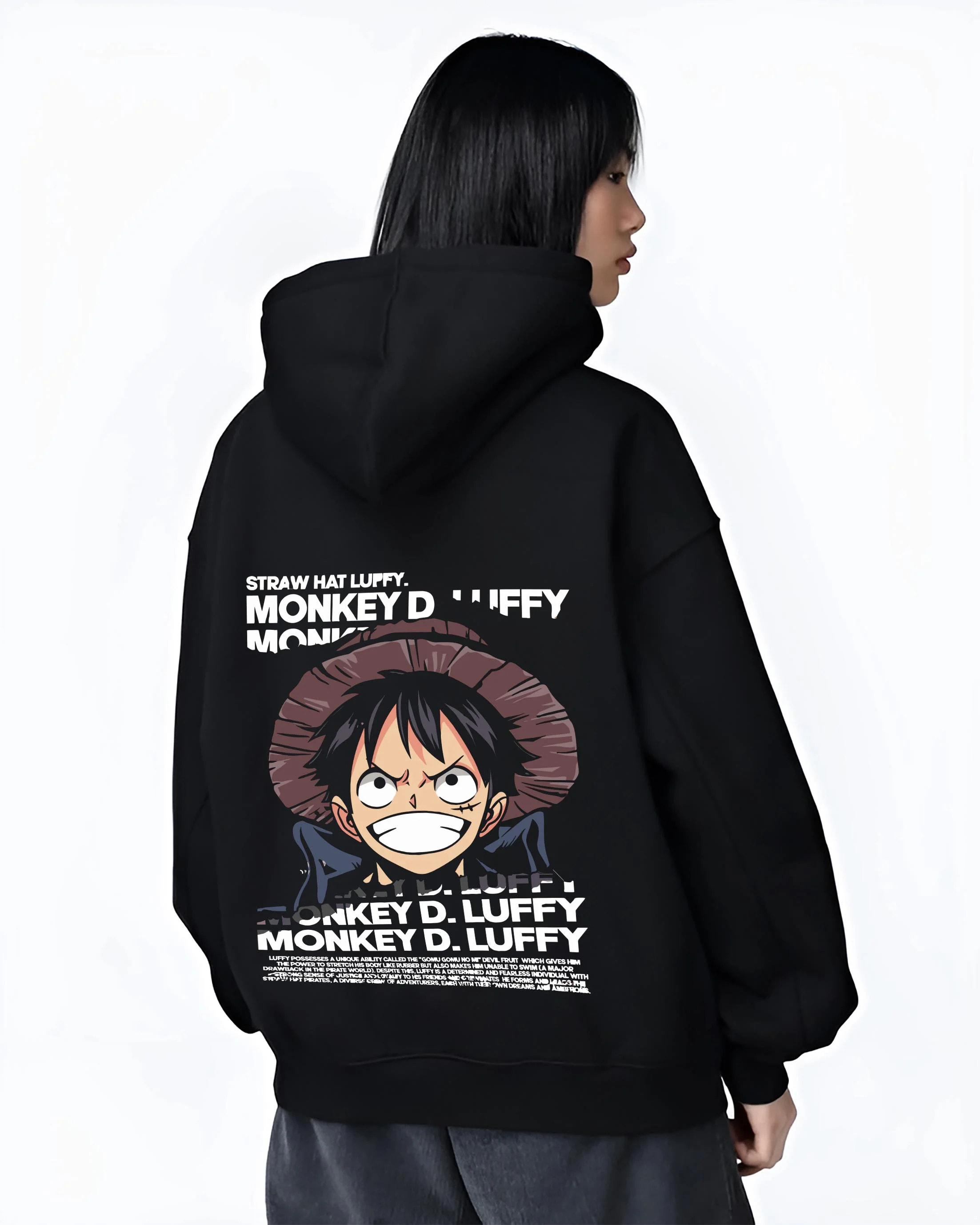 Black hoodie worn by female model, back view with Monkey D Luffy Hoodie One Piece Pirate King graphic bold anime graphic.