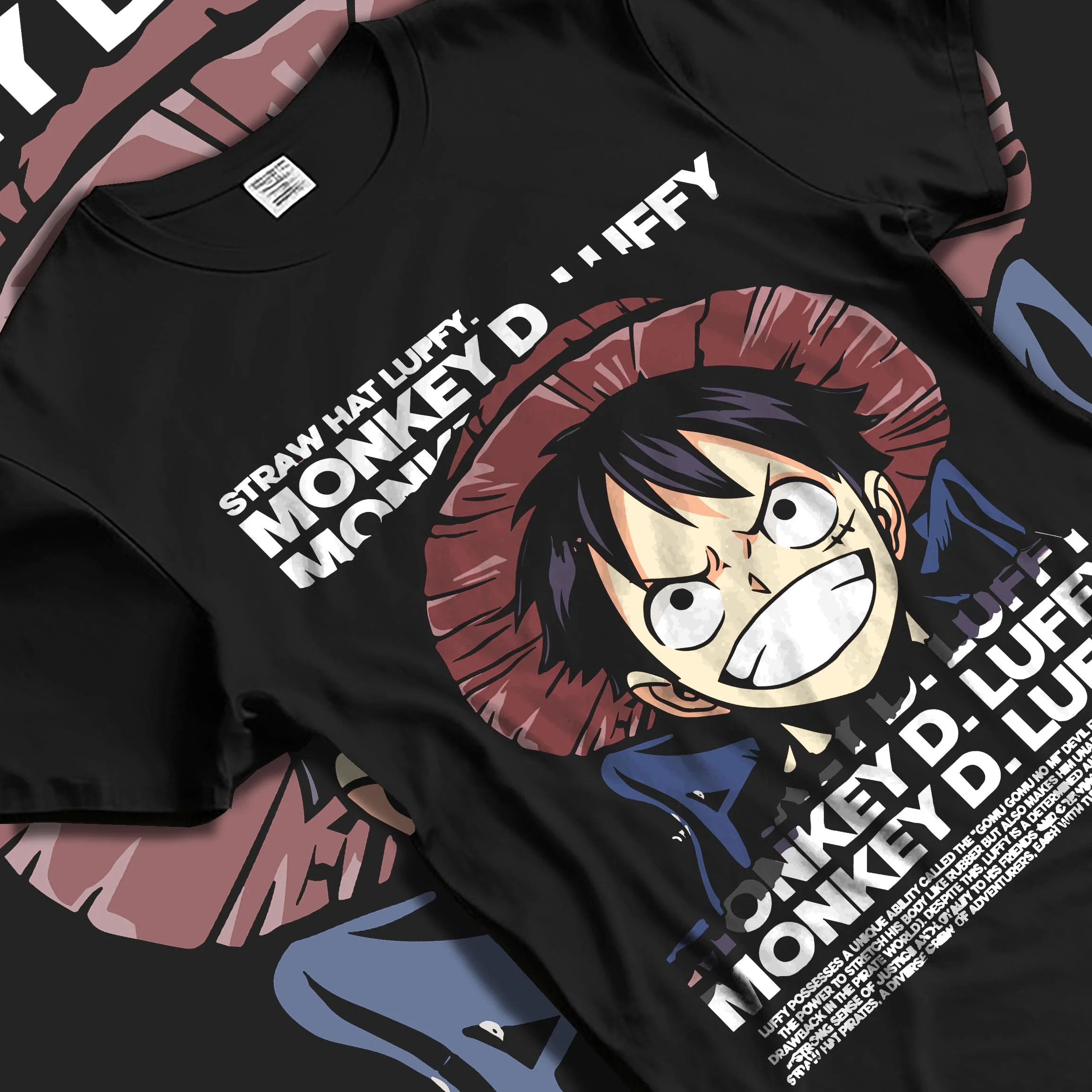 Black T-shirt laid flat with natural folds with Monkey D Luffy Hoodie One Piece Pirate King graphic bold anime graphic.
