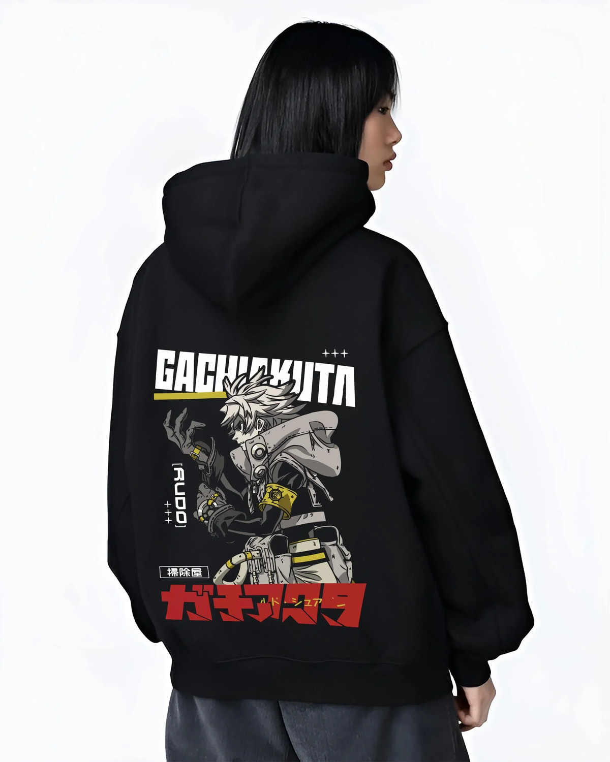 Black hoodie worn by female model, back view with Rudo Hoodie Gachiakuta Combat Jacket Edition graphic Rudo themed artwork.