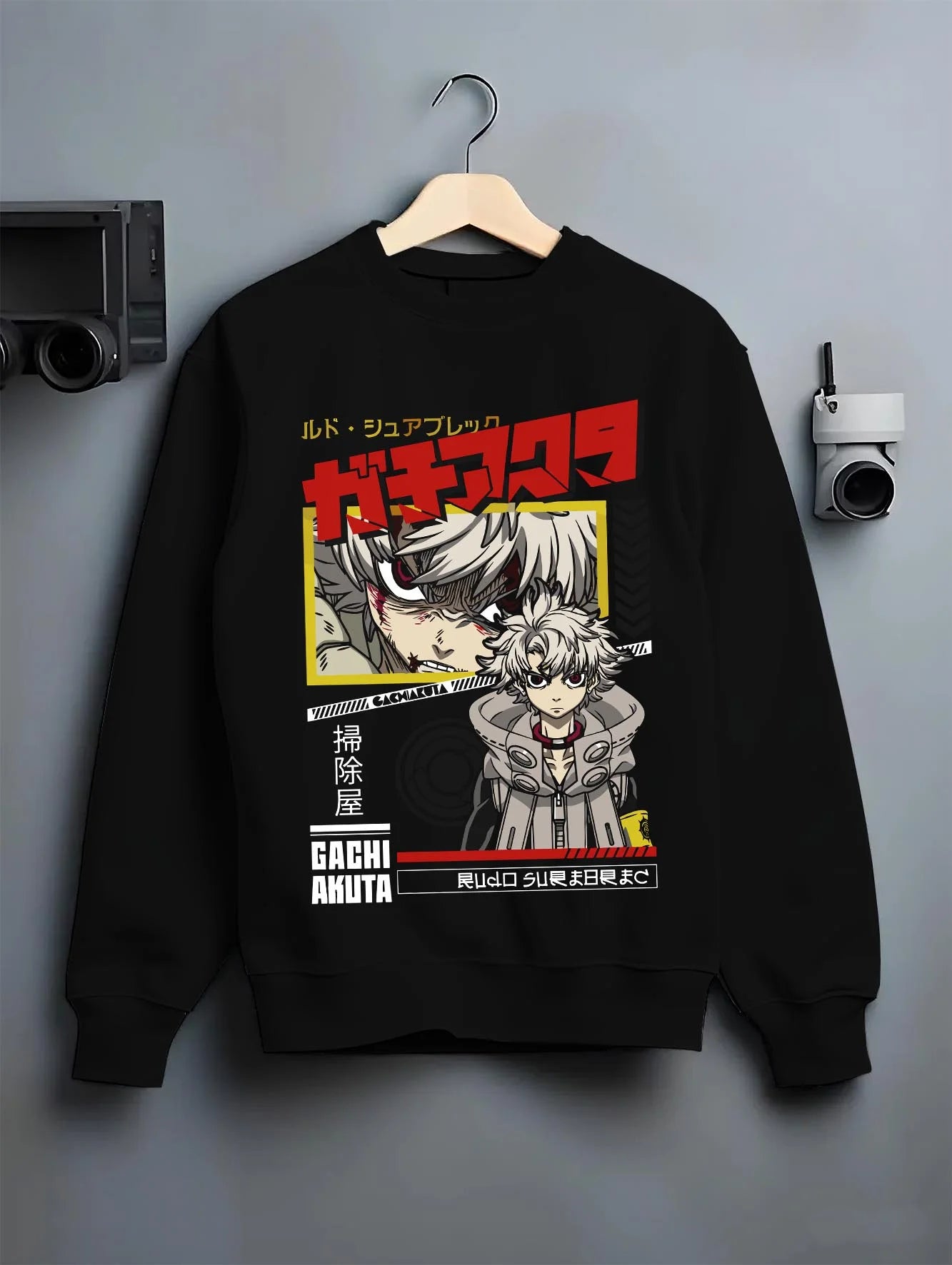 Black crewneck sweatshirt on hanger with Rudo Hoodie Gachiakuta Crouch Pose Graphic graphic streetwear graphic.