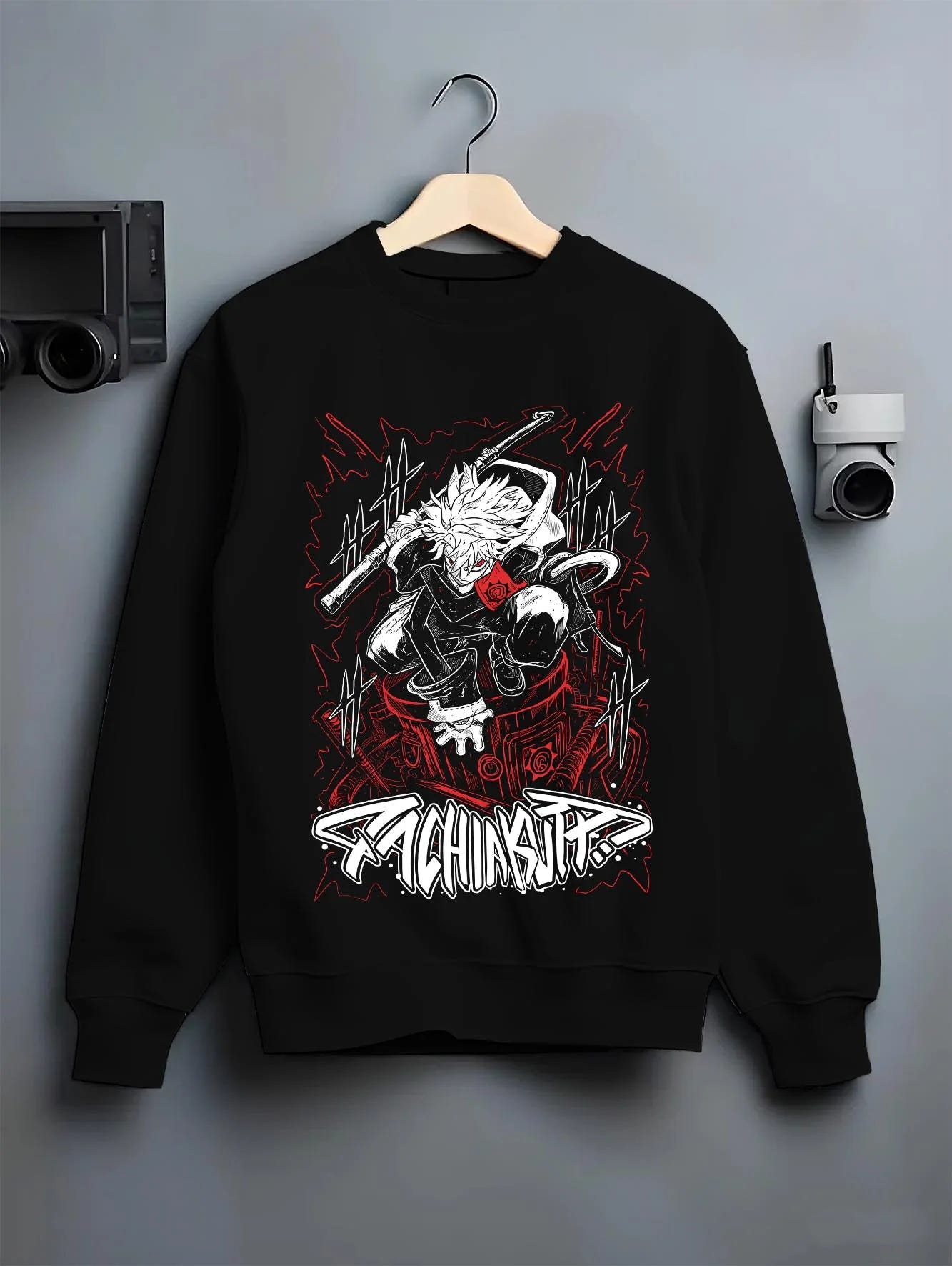 Black crewneck sweatshirt on hanger with Rudo Hoodie Gachiakuta Sword Combat Stance graphic bold anime graphic.