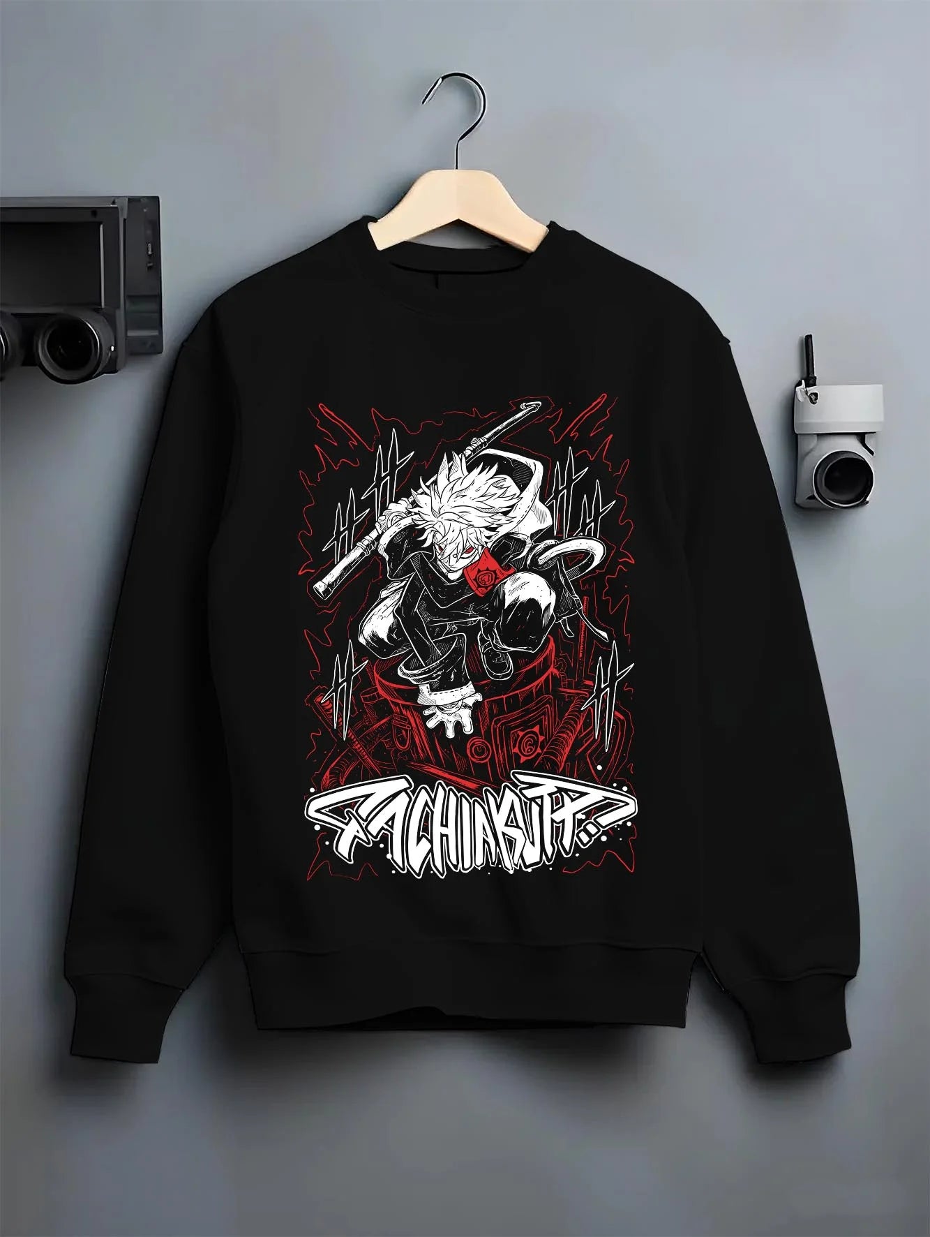Black crewneck sweatshirt on hanger with Rudo Hoodie Gachiakuta Sword Combat Stance graphic bold anime graphic.