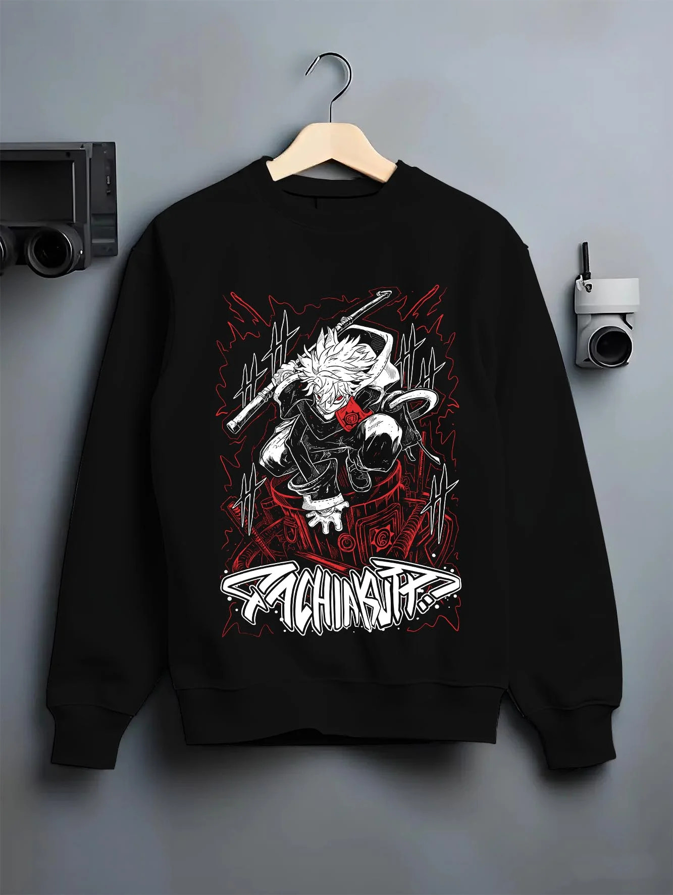 Black crewneck sweatshirt on hanger with Rudo Hoodie Gachiakuta Sword Combat Stance graphic bold anime graphic.