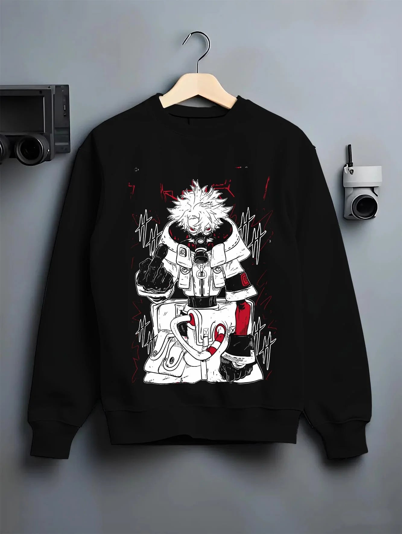 Black crewneck sweatshirt on hanger with Rudo Hoodie Gachiakuta Toxic Red Gas Mask graphic streetwear graphic.