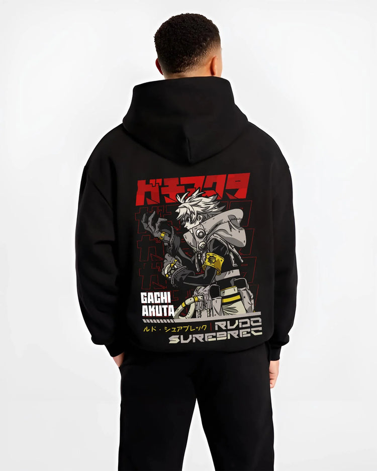 Black hoodie worn by male model, back view with Rudo Hoodie Gachiakuta Weaponized Armor Suit graphic streetwear graphic.