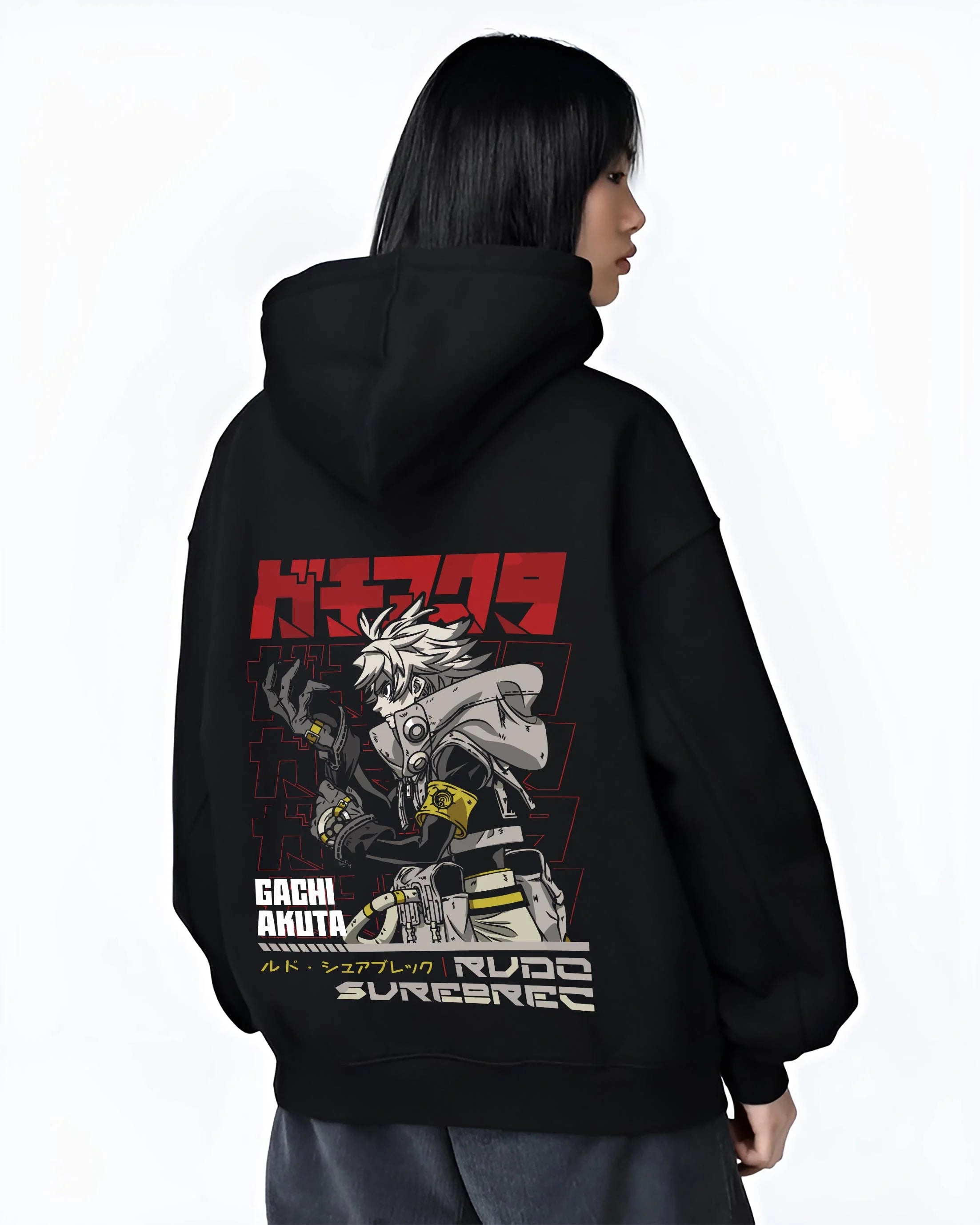 Black hoodie worn by female model, back view with Rudo Hoodie Gachiakuta Weaponized Armor Suit graphic bold anime graphic.