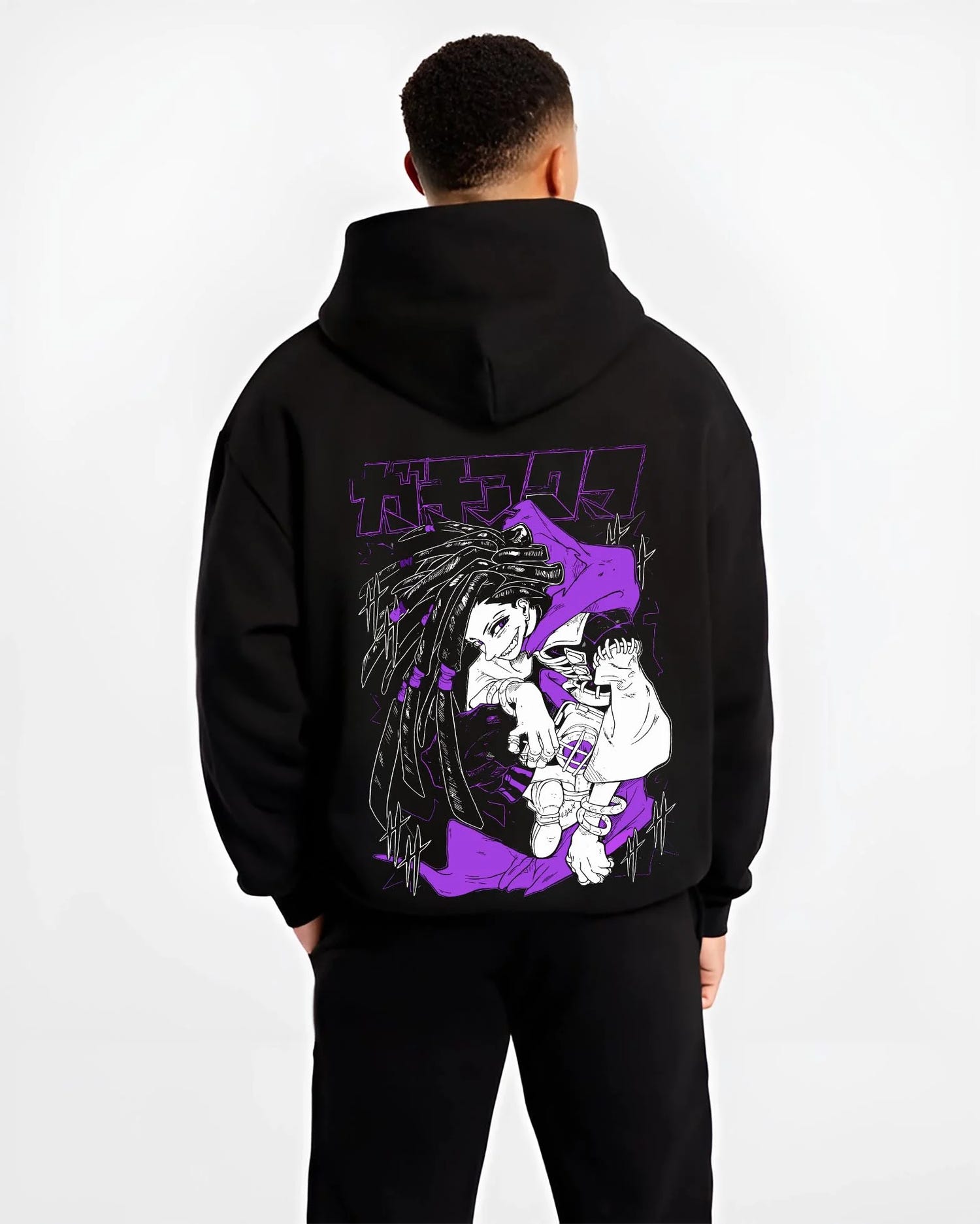 Black hoodie worn by male model, back view with Rudo Hoodie Gachiakuta Purple Dreadlock Form graphic premium wear.