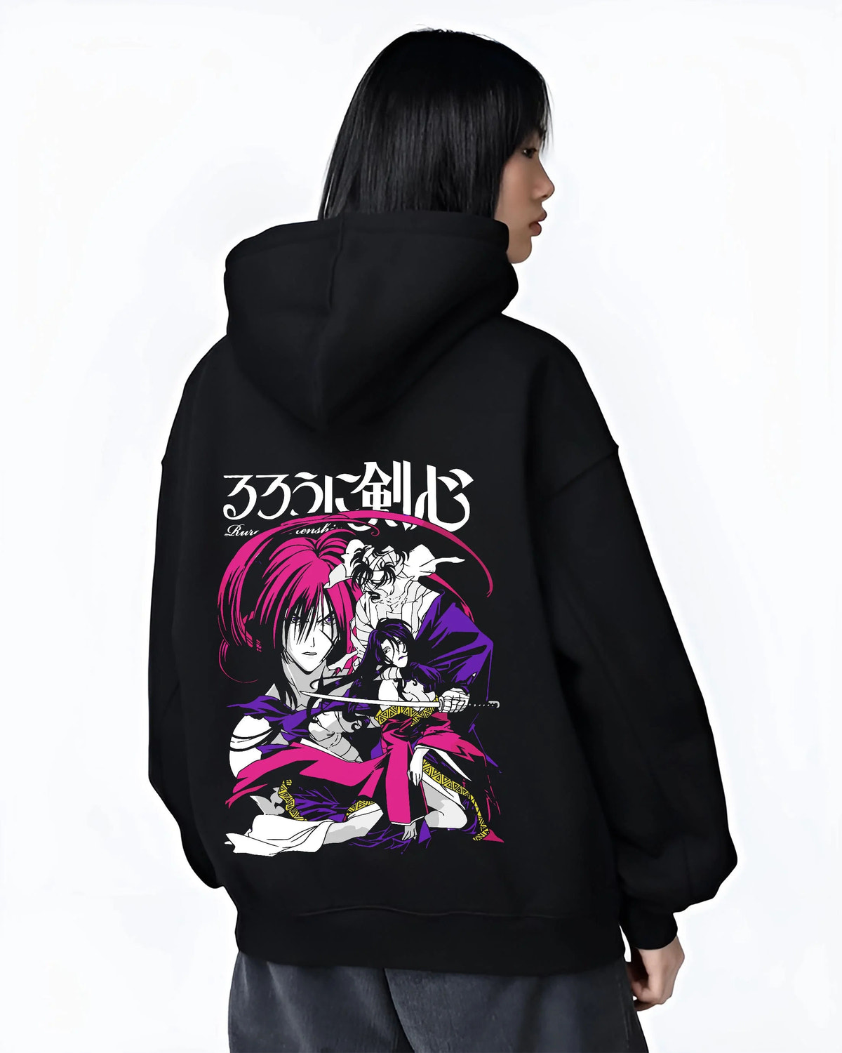 Black hoodie worn by female model from the back featuring Kenshin Himura reverse blade sword Rurouni Kenshin artwork.