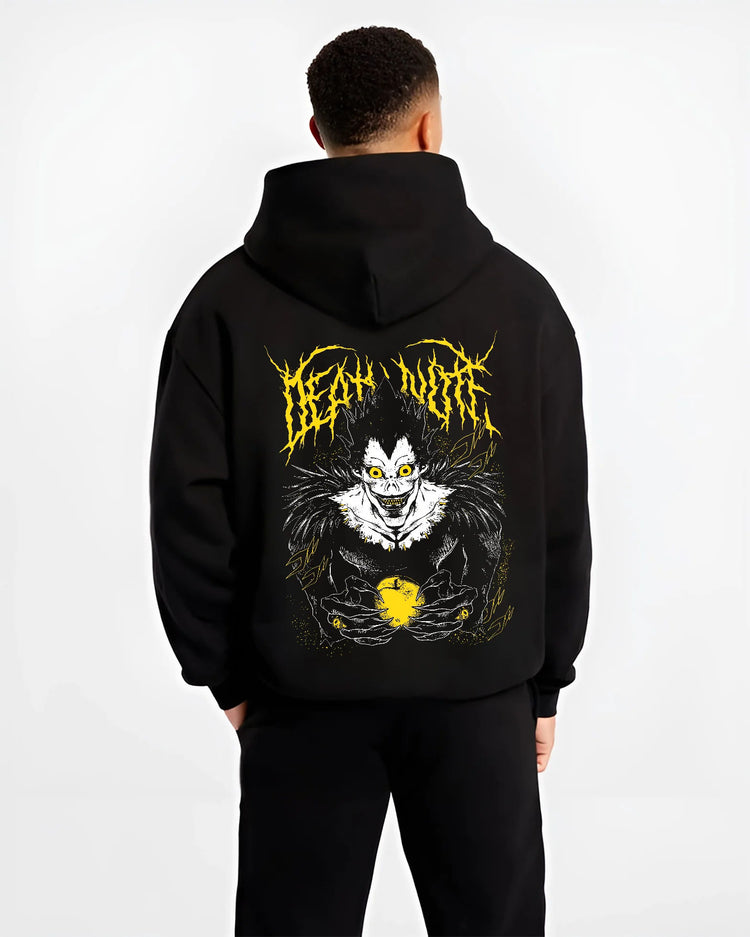Black hoodie model back view showing Ryuk from Death Note: Shinigami with apple