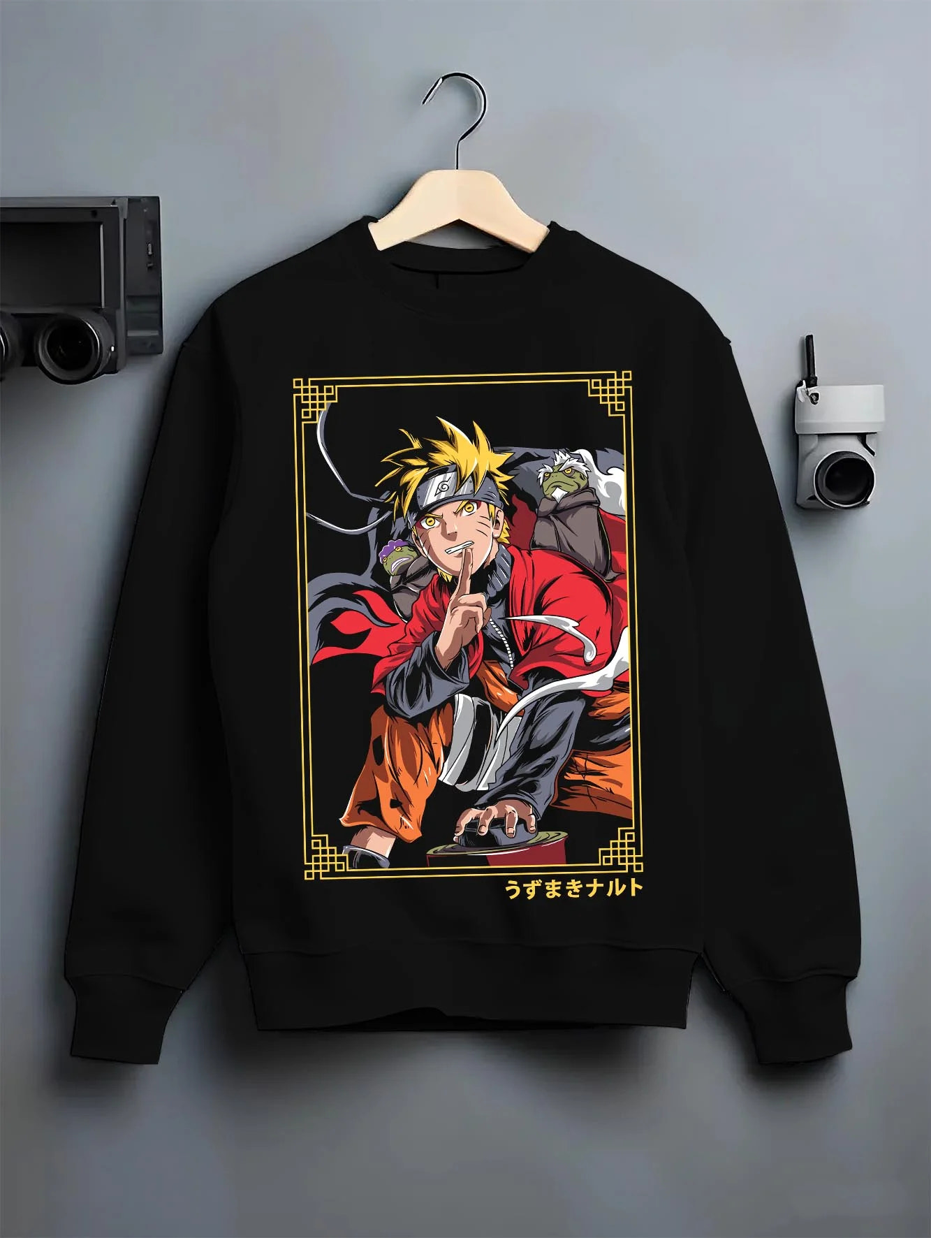 Black crewneck sweatshirt on hanger with Naruto Uzumaki Hoodie Naruto Shippuden Sage Pose graphic streetwear graphic.