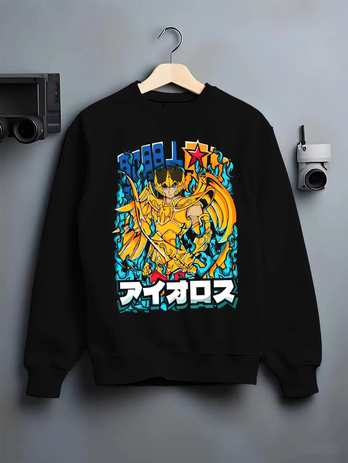 Black crewneck sweatshirt on hanger featuring Sagittarius Aiolos Gold Cloth Saint Seiya artwork.