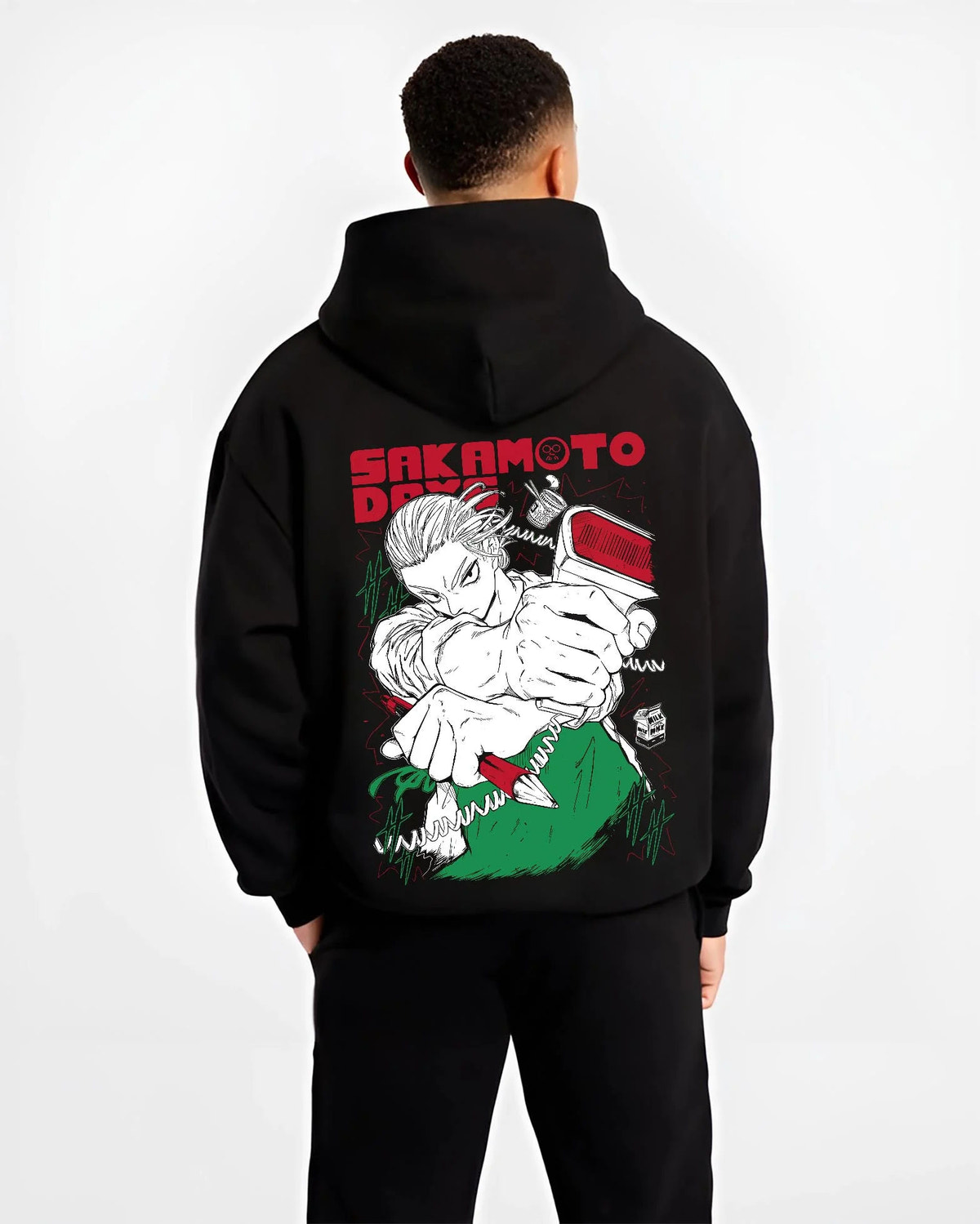 Black hoodie worn by male model from the back featuring Sakamoto Days cool assassin fight scene artwork.