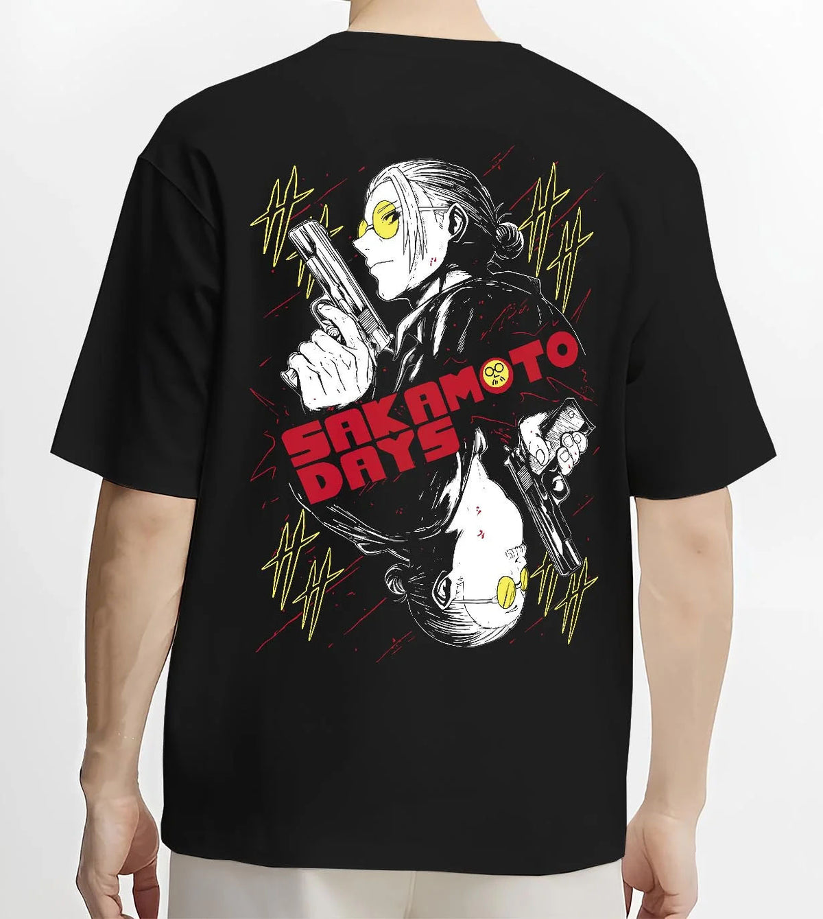 Black T-shirt worn by male model from the back featuring Sakamoto Days elite assassin gunfight artwork.