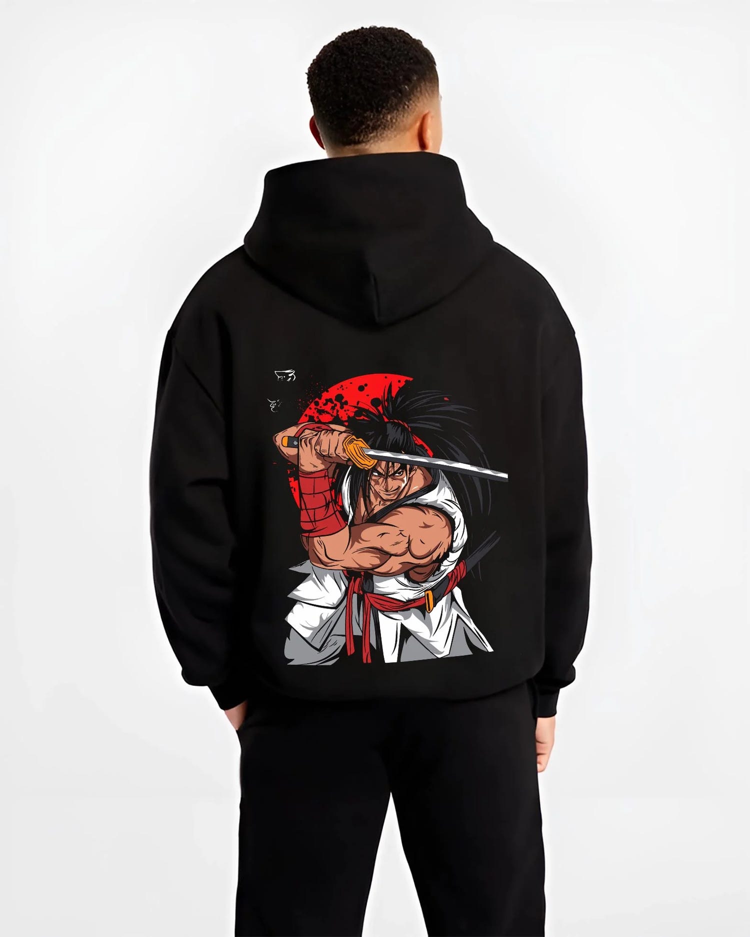 Black hoodie worn by male model, back view with Haohmaru Hoodie Samurai Shodown Sword Master graphic bold anime graphic.
