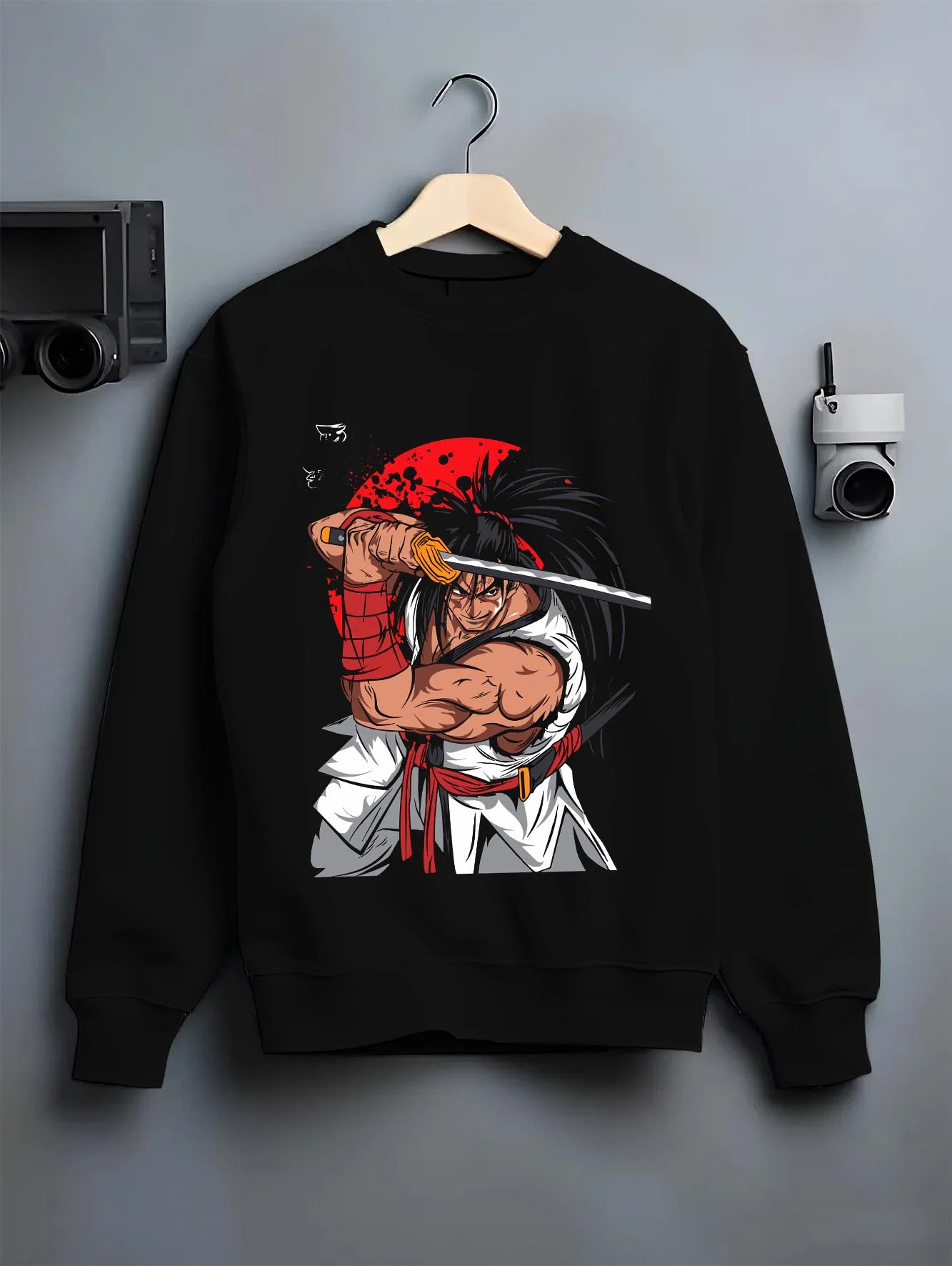 Black crewneck sweatshirt on hanger with Haohmaru Hoodie Samurai Shodown Sword Master graphic bold anime graphic.