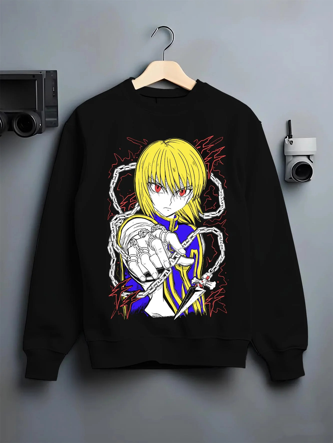 Black crewneck sweatshirt on hanger with Kurapika Hoodie Hunter x Hunter Chain Emperor graphic bold anime graphic.