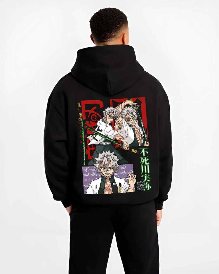 Black hoodie worn by male model from the back featuring Sanemi Shinazugawa Wind Hashira scars Demon Slayer artwork.