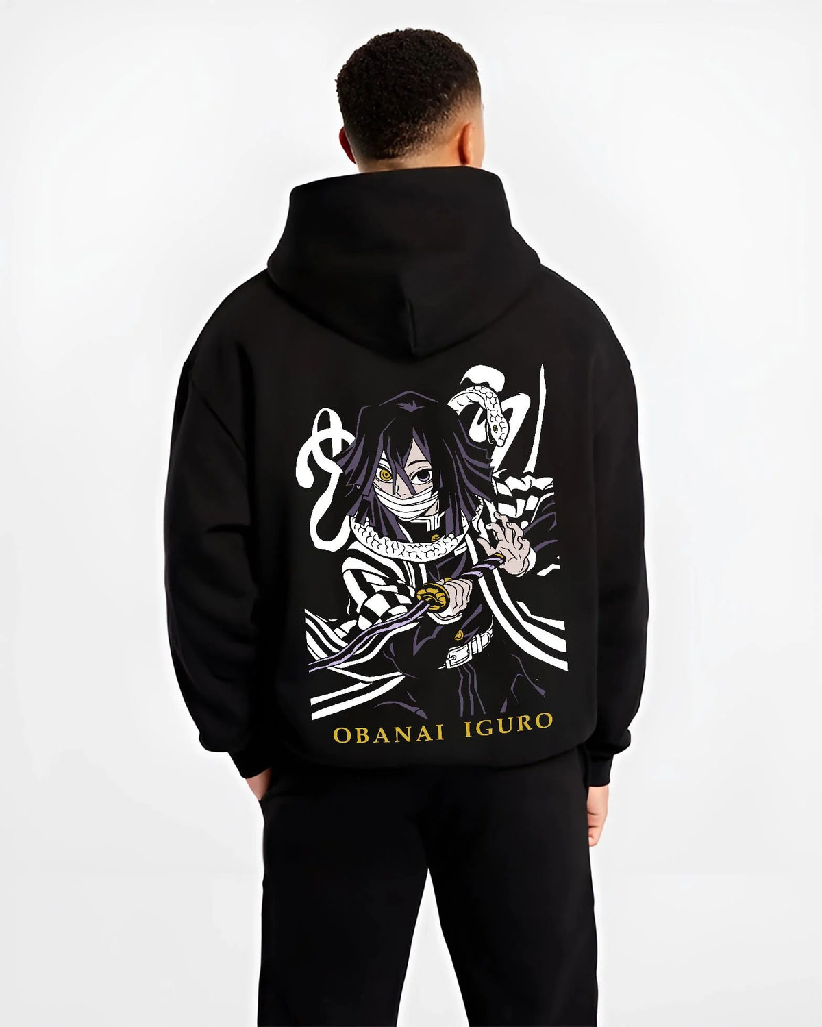 Black hoodie worn by male model from the back featuring Obanai Iguro Serpent Breathing snake Demon Slayer artwork.