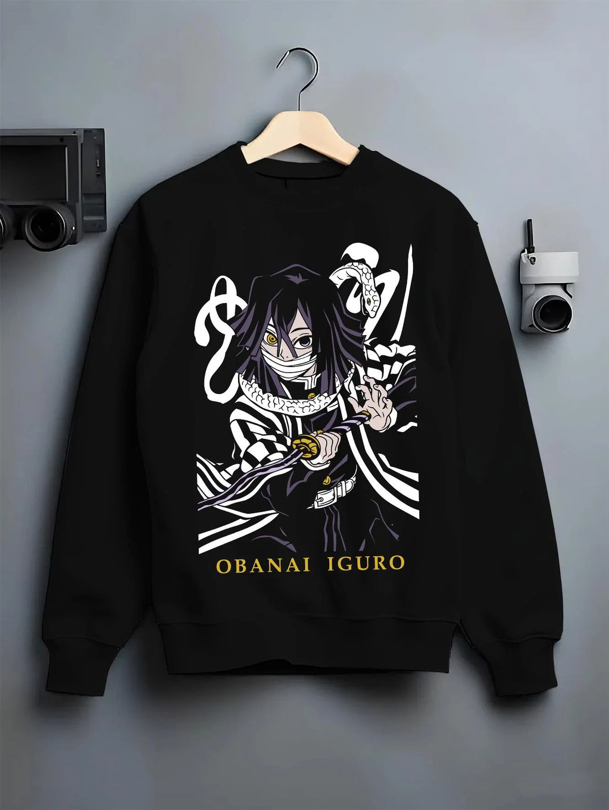 Black crewneck sweatshirt on hanger featuring Obanai Iguro Serpent Breathing snake Demon Slayer artwork.