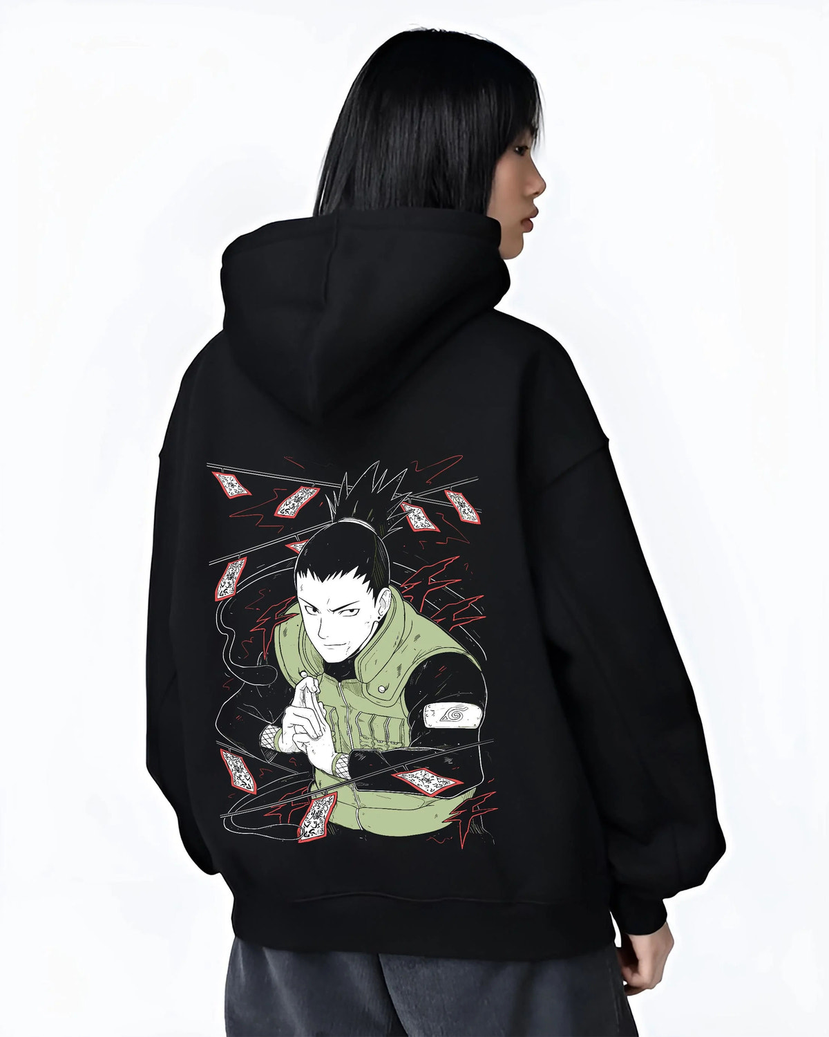 Black hoodie worn by female model from the back featuring Shikamaru Nara Shadow Possession Jutsu Naruto artwork.