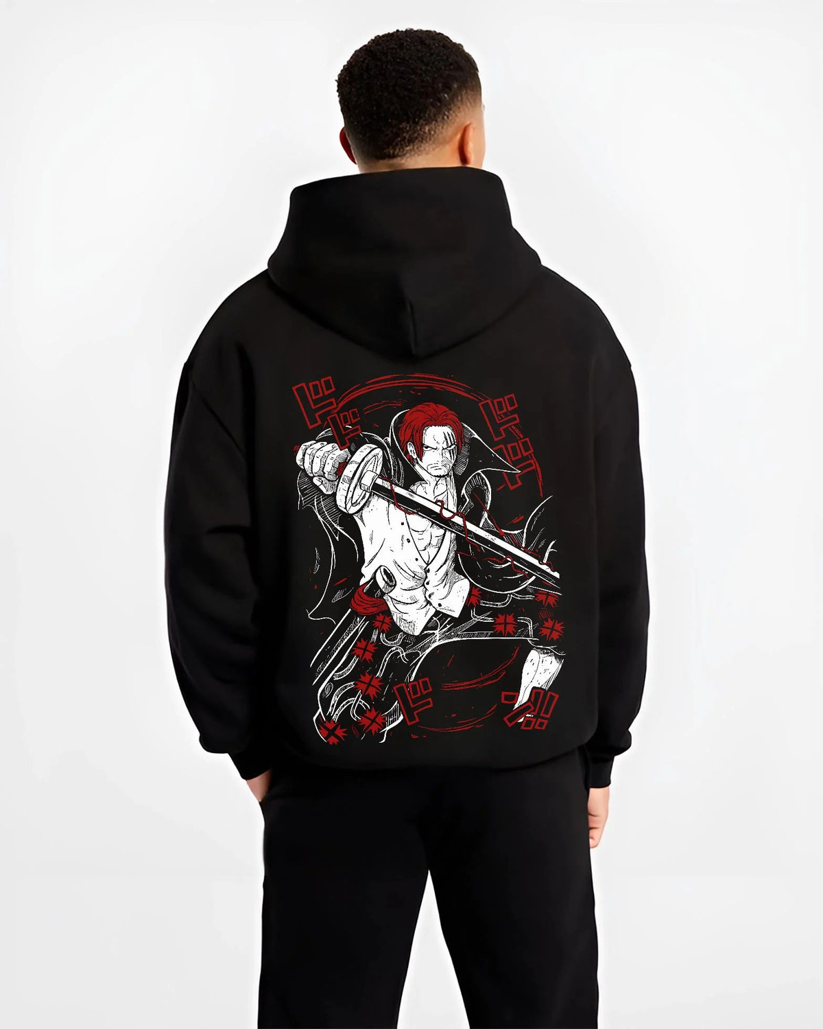 Black hoodie worn by male model from the back featuring Shanks Red Hair Emperor Haki One Piece artwork.
