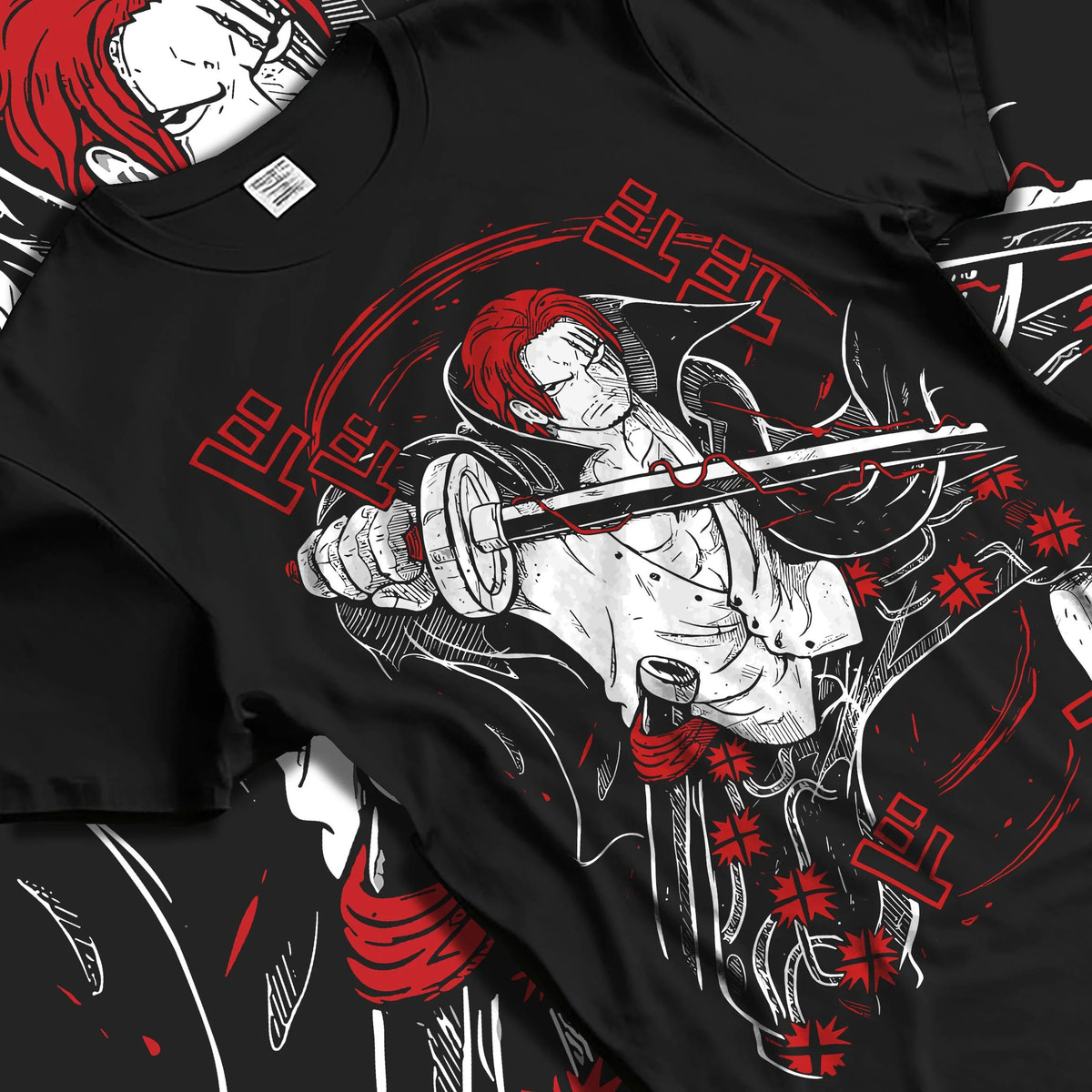 Black T-shirt laid flat with natural folds featuring Shanks Red Hair Emperor Haki One Piece artwork.