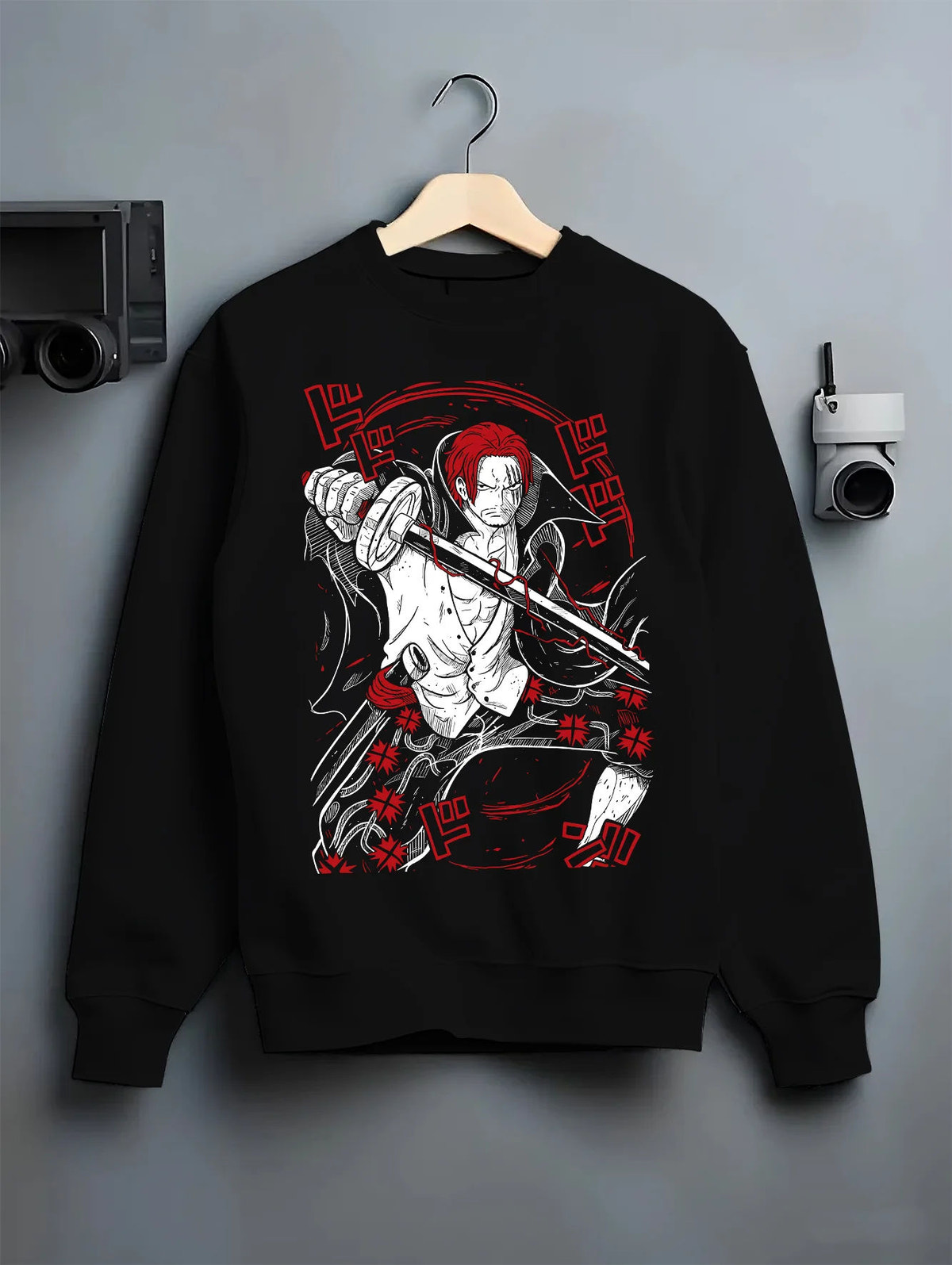 Black crewneck sweatshirt on hanger showing Red-Haired Shanks from One Piece: sword and pirate poster