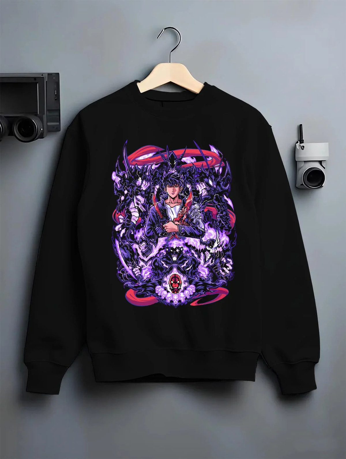 Black crewneck sweatshirt on hanger featuring Sung Jin-Woo purple Shadow Army Solo Leveling artwork.
