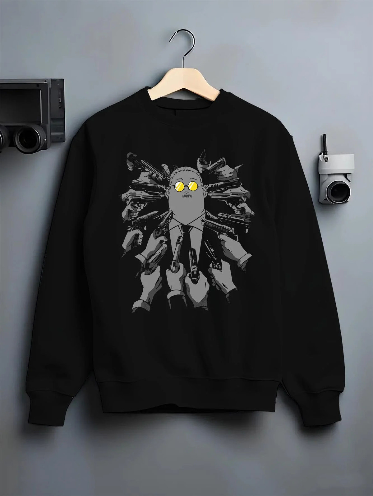 Black crewneck sweatshirt on hanger featuring Taro Sakamoto hidden arsenal Sakamoto Days artwork.