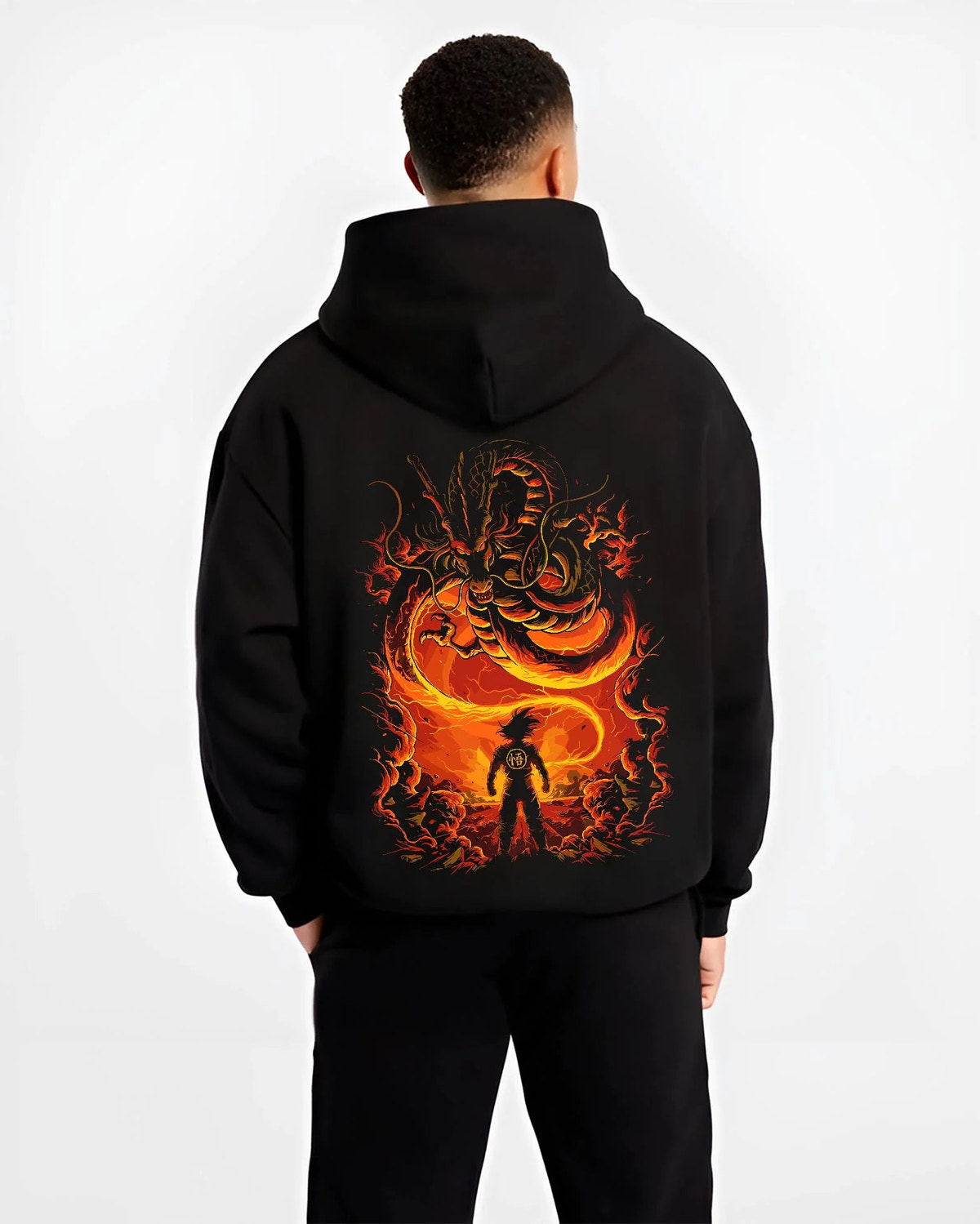 Black hoodie worn by male model from the back featuring Shenron Eternal Dragon wish power Dragon Ball artwork.