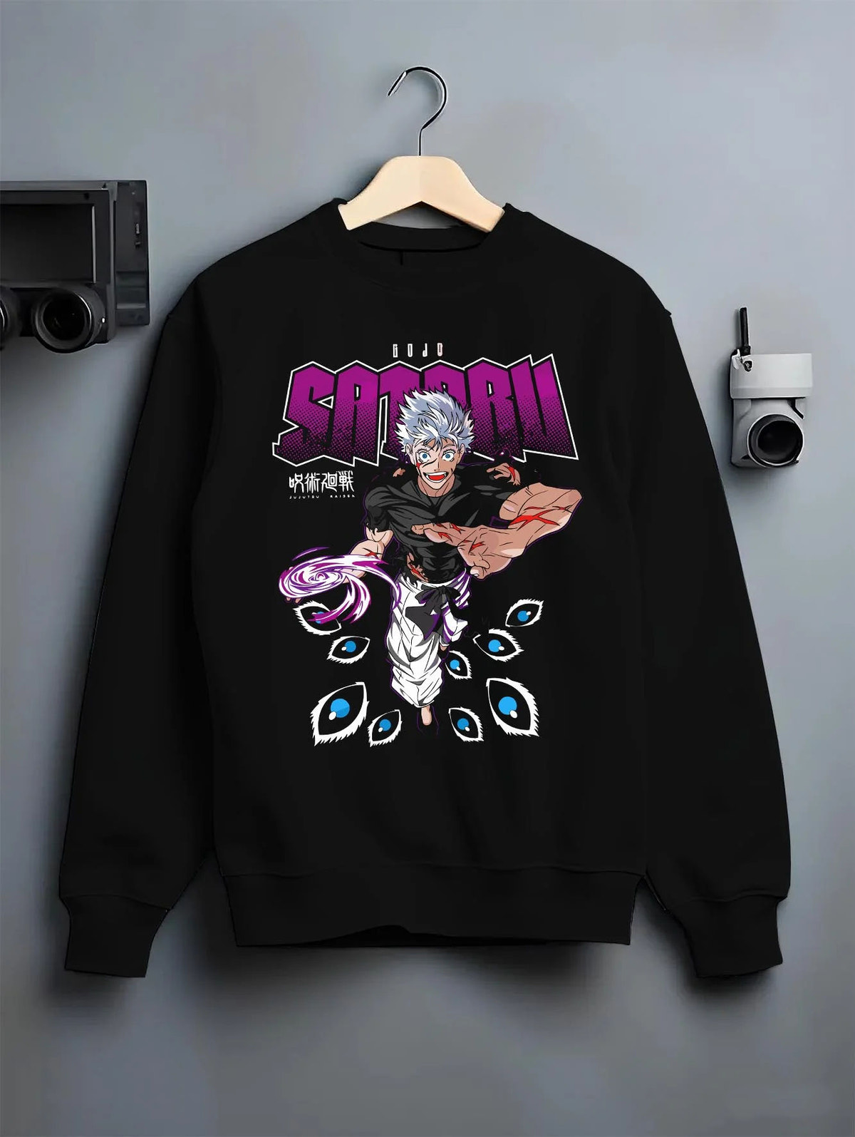 Black crewneck sweatshirt on hanger featuring Gojo Satoru Six Eyes Limitless Jujutsu Kaisen artwork.