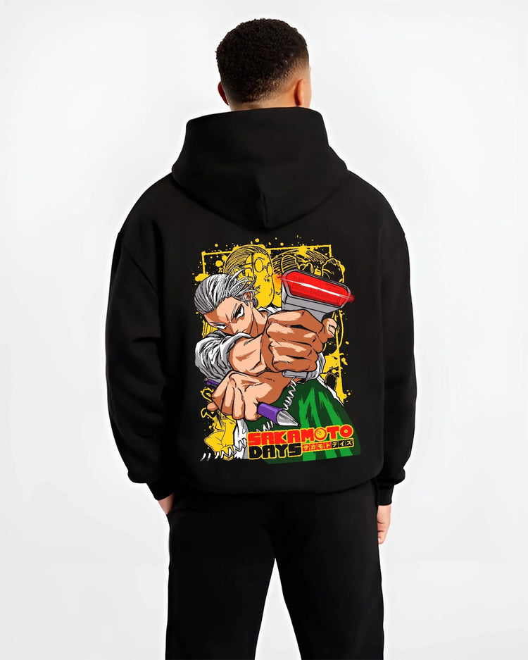 Black hoodie worn by male model from the back featuring Taro Sakamoto slim assassin battle Sakamoto Days artwork.