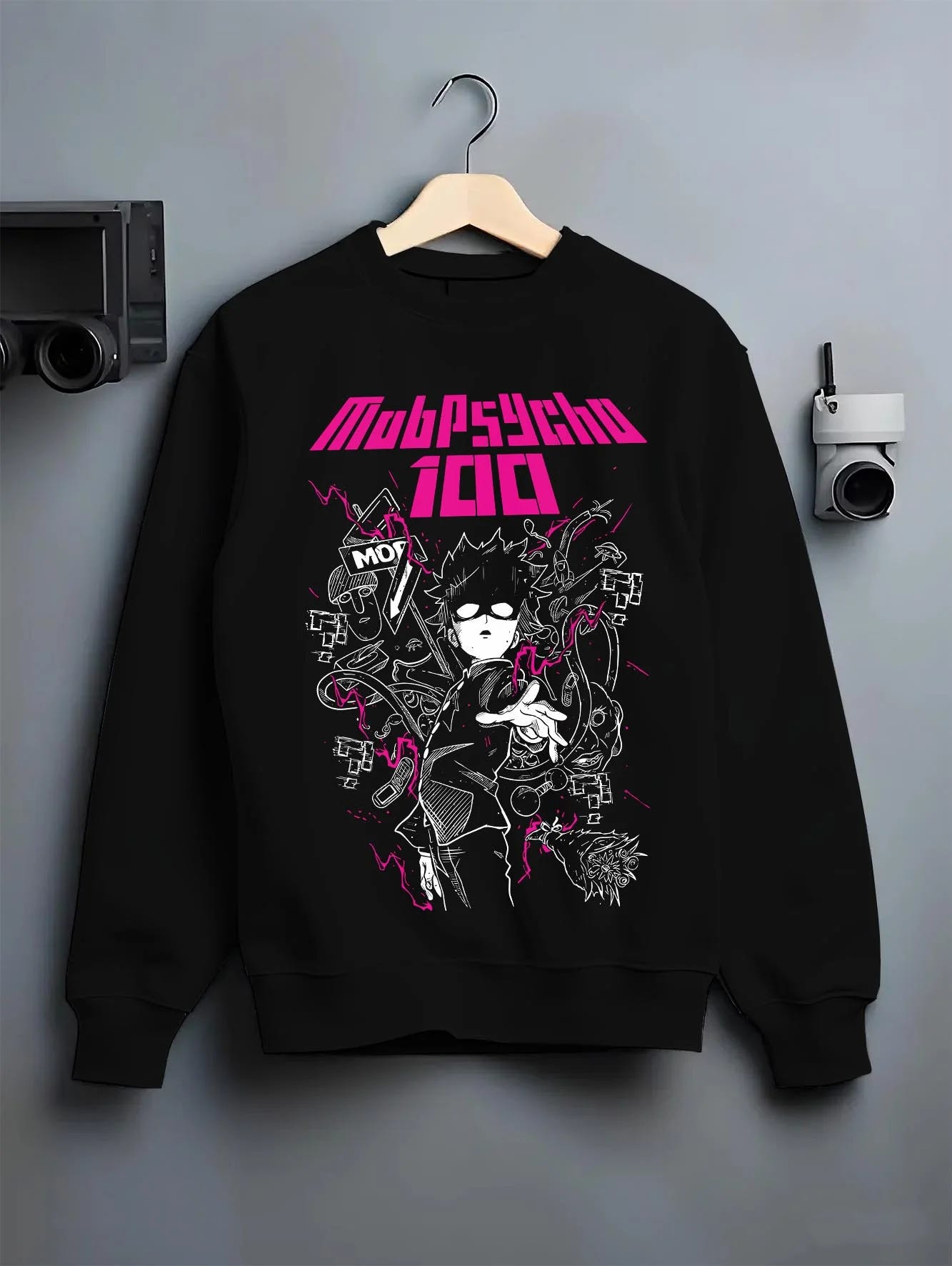 Black crewneck sweatshirt on hanger with Shigeo Kageyama Hoodie Mob Psycho 100 Shadow graphic premium wear.