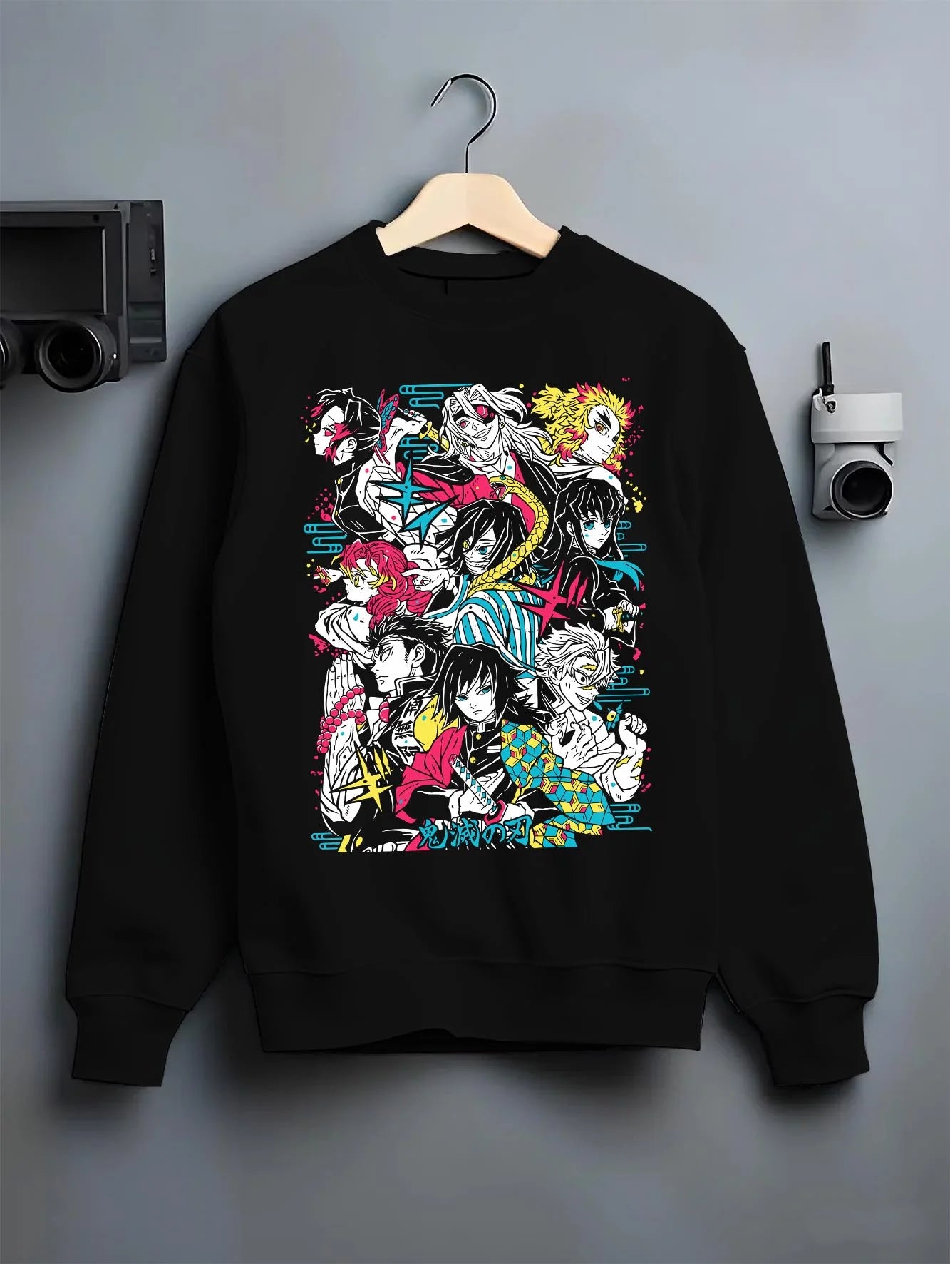 Black crewneck sweatshirt on hanger with Tanjiro Group Hoodie Demon Slayer Anime Water Hashira graphic streetwear graphic.