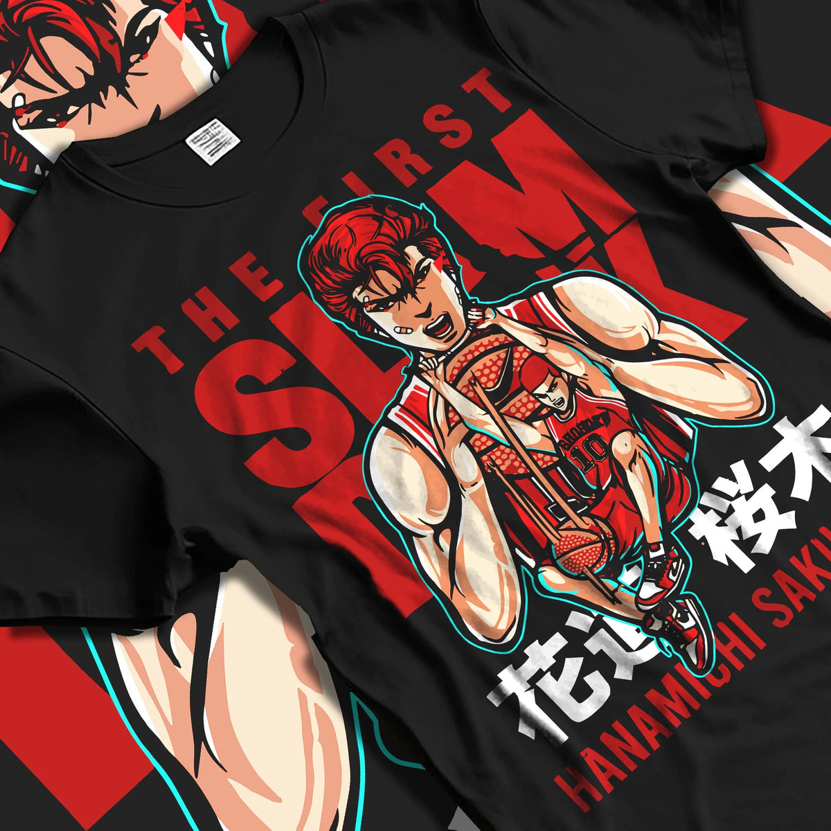 Black T-shirt laid flat with natural folds featuring Hanamichi Sakuragi Shohoku basketball Slam Dunk artwork.