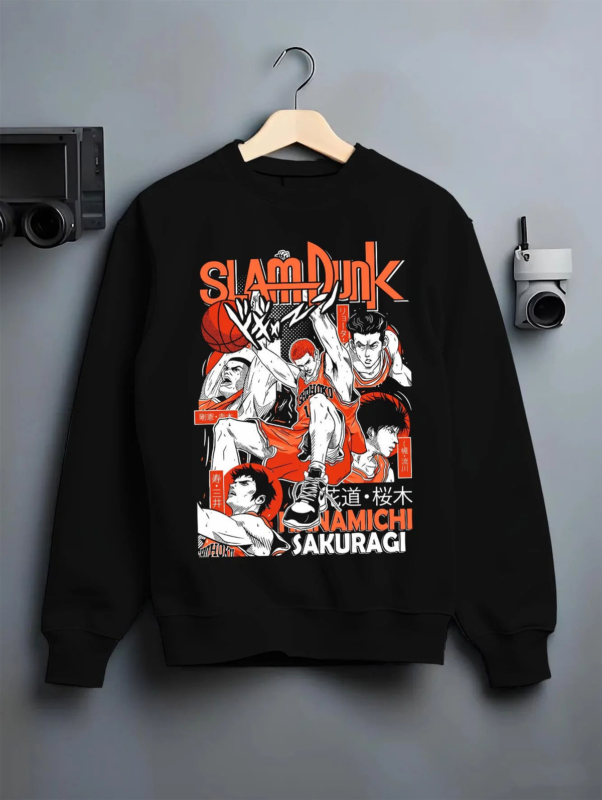 Black crewneck sweatshirt on hanger featuring Hanamichi Sakuragi rebound basketball Slam Dunk artwork.