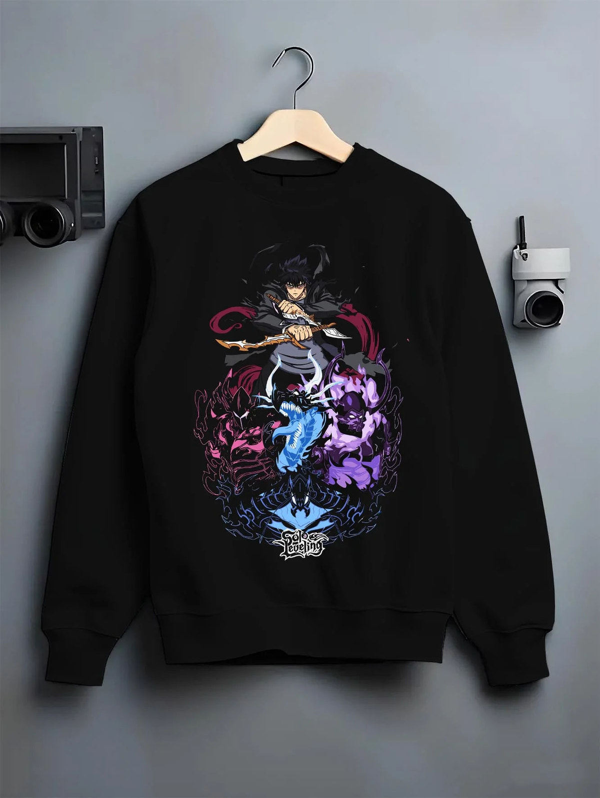 Black crewneck sweatshirt on hanger featuring Sung Jin-Woo Shadow Army battle Solo Leveling artwork.