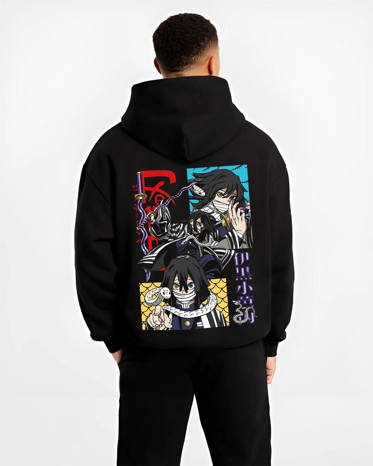 Black hoodie worn by male model from the back featuring Obanai Iguro Snake Pillar serpent Demon Slayer artwork.