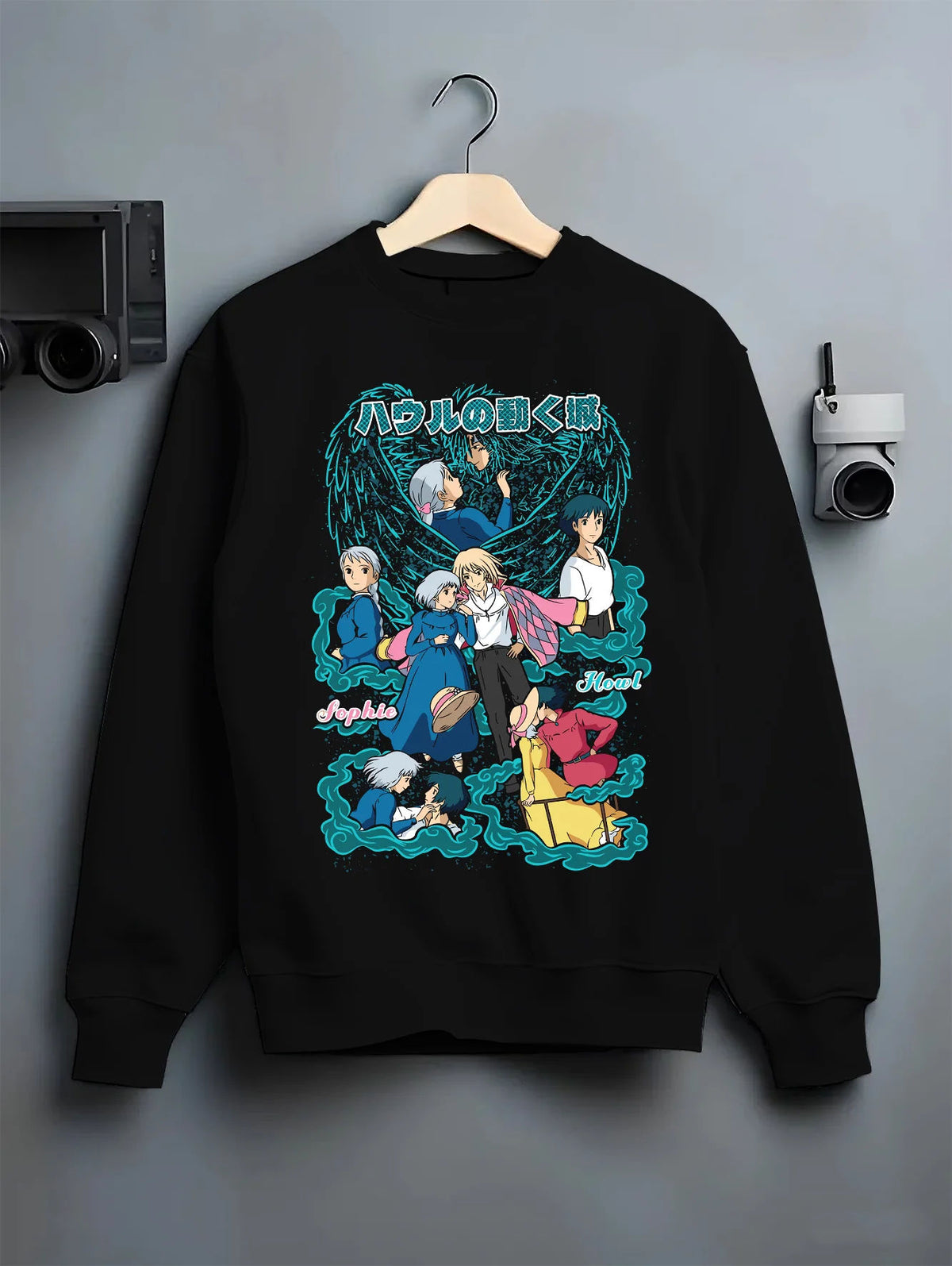 Black crewneck sweatshirt on hanger with Sophie, Howl and cast of Howl's Moving Castle from Studio Ghibli / Howl's Moving
