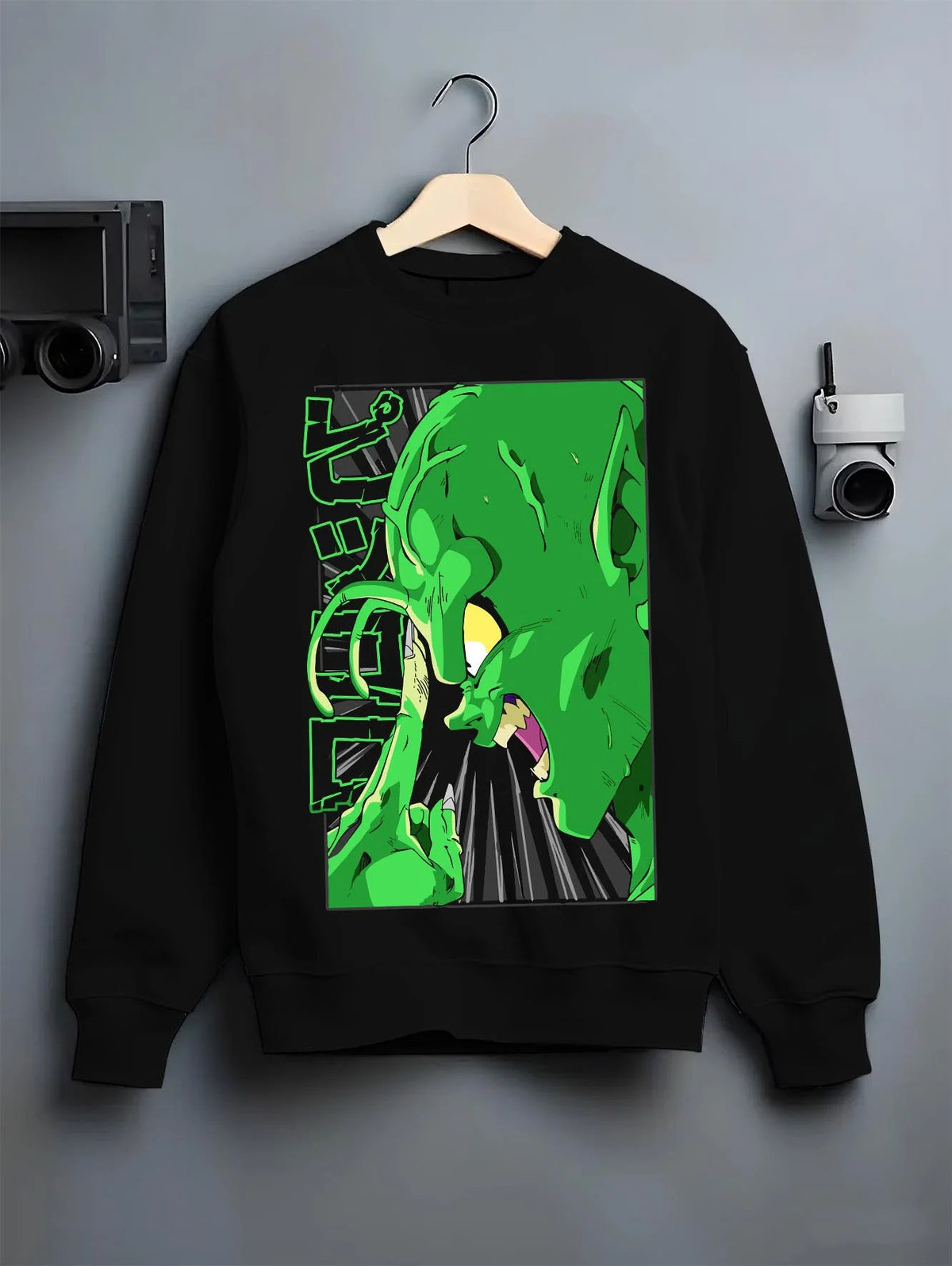 Black crewneck sweatshirt on hanger featuring Piccolo Special Beam Cannon Dragon Ball Z artwork.