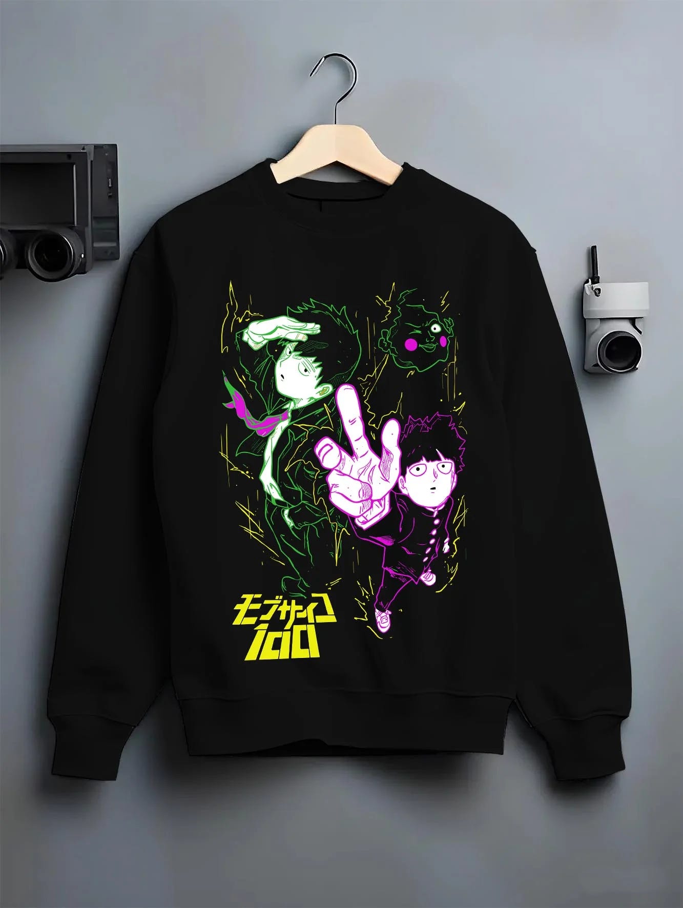 Black crewneck sweatshirt on hanger with Shigeo Kageyama Hoodie Mob Psycho 100 Spirit Aura graphic premium wear.