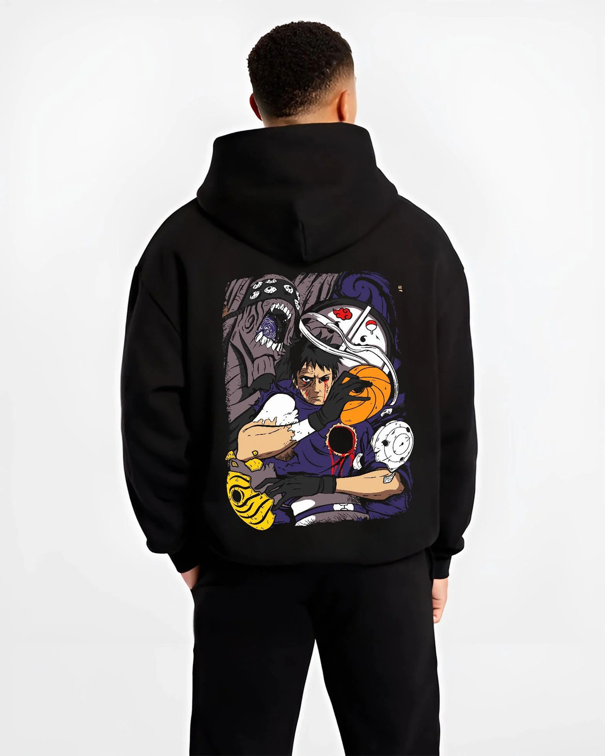 Black hoodie worn by male model from the back featuring Obito Uchiha Tobi spiral masks Naruto artwork.