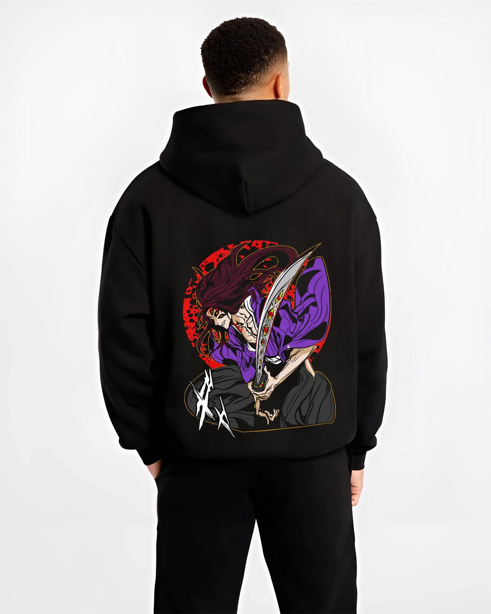 Black hoodie worn by male model, back view with Ryomen Sukuna Hoodie Jujutsu Kaisen Curse Demon graphic premium wear.