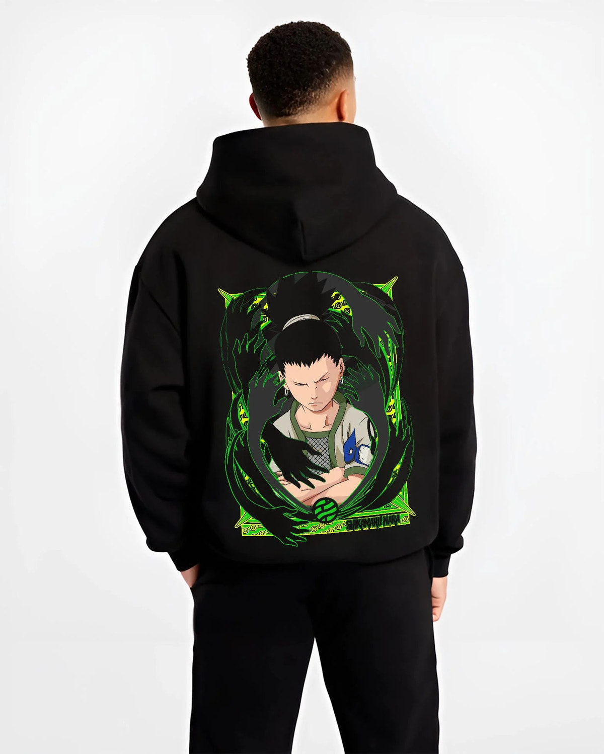Black hoodie worn by male model from the back featuring Shikamaru Nara Shadow Possession Jutsu Naruto artwork.