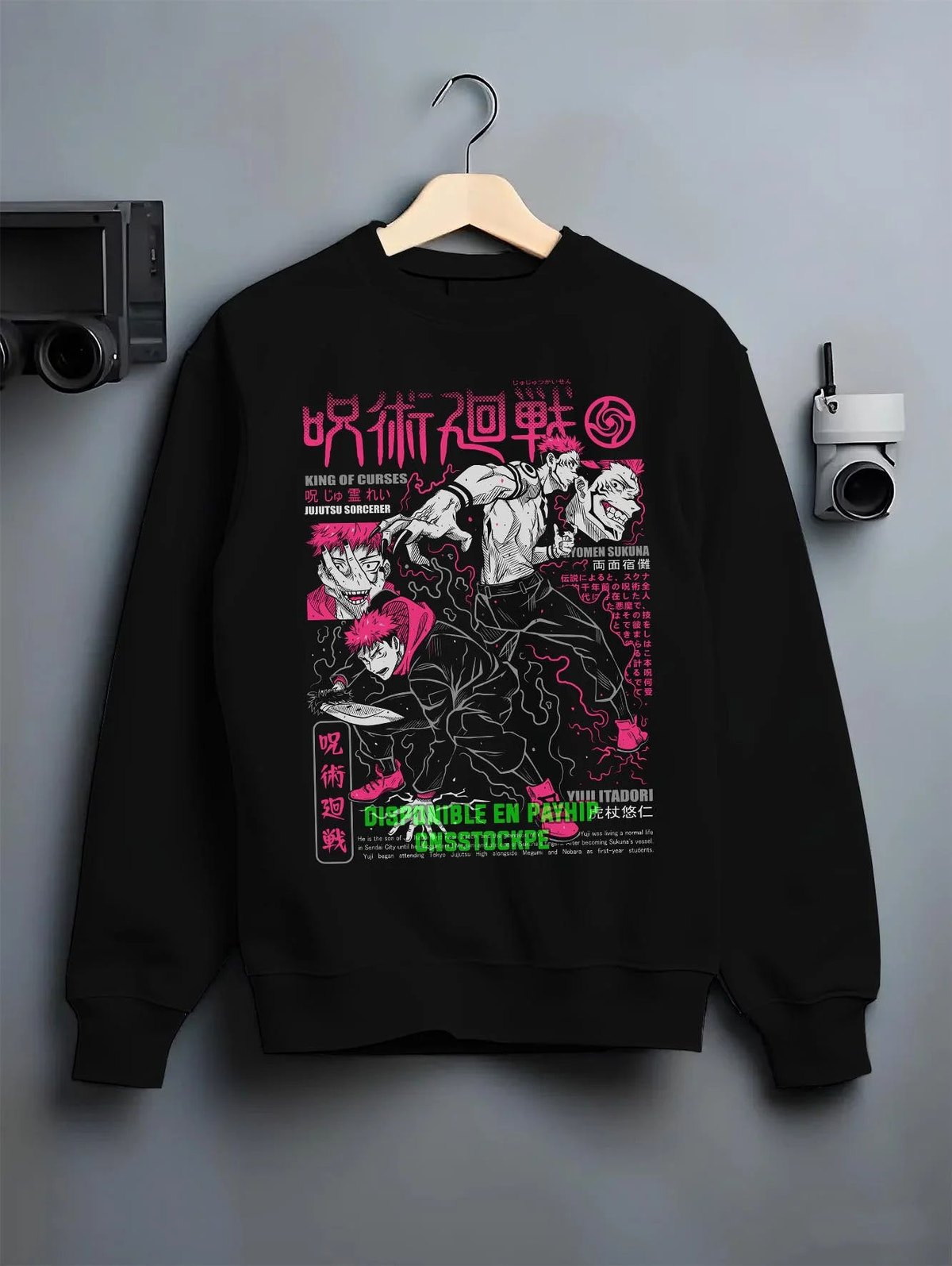 Black crewneck sweatshirt on hanger featuring Ryomen Sukuna King of Curses battle collage Jujutsu Kaisen artwork.