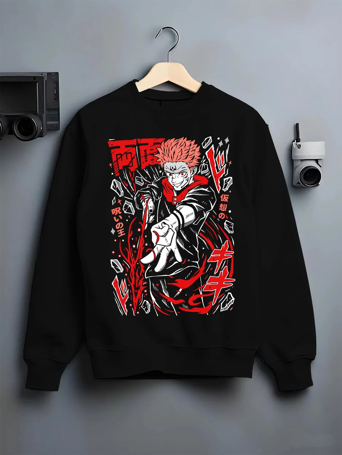 Black crewneck sweatshirt on hanger featuring Ryomen Sukuna Domain Expansion Jujutsu Kaisen artwork.