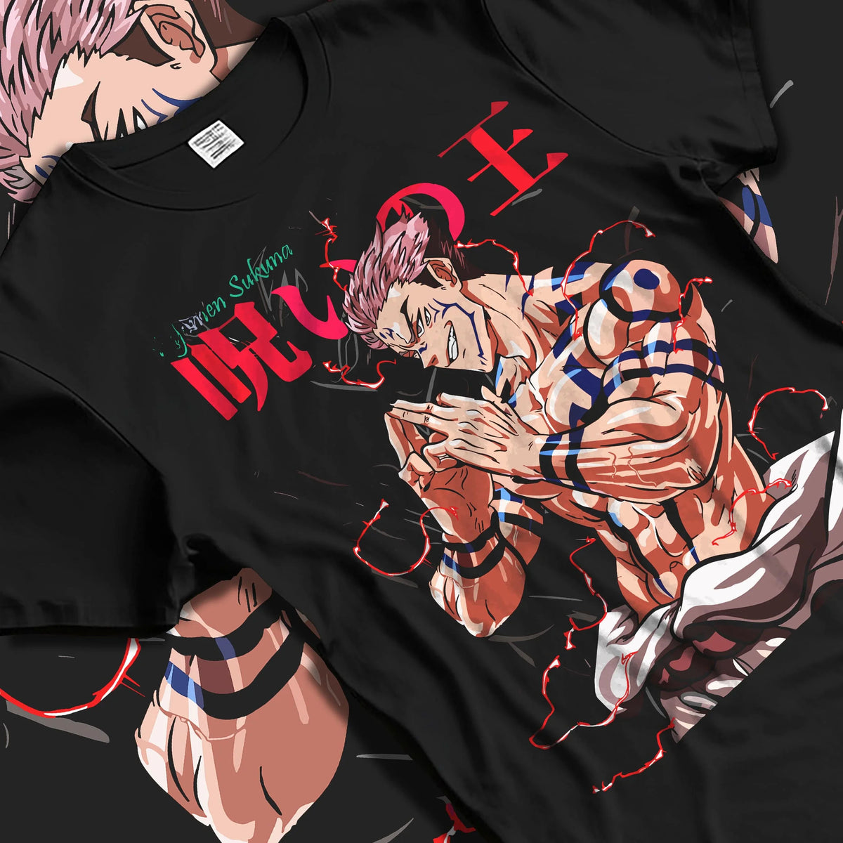 Black T-shirt laid flat with natural folds featuring Ryomen Sukuna Heian form Jujutsu Kaisen artwork.