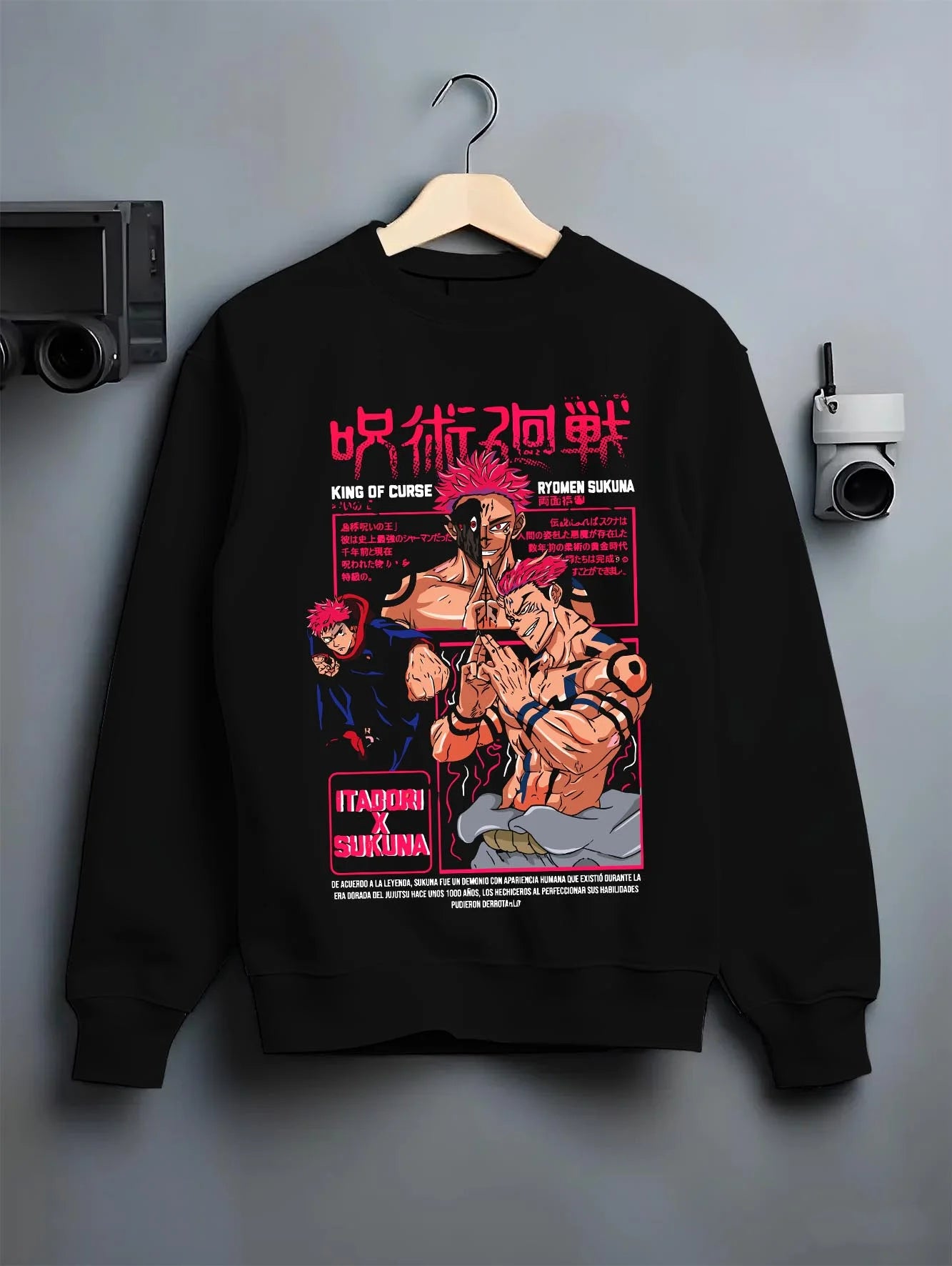 Black crewneck sweatshirt on hanger with Sukuna Hoodie Jujutsu Kaisen King of Curses graphic bold anime graphic.