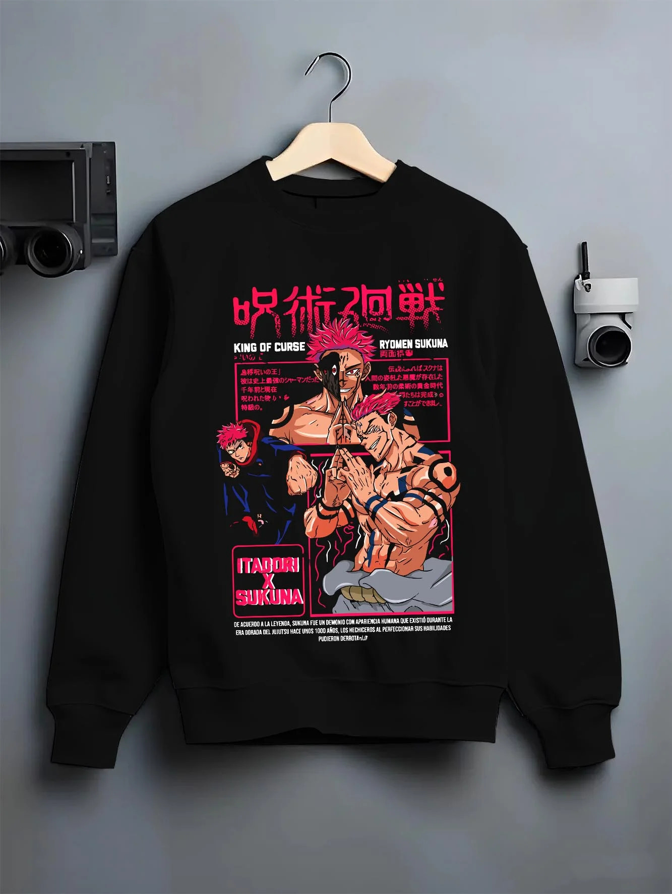 Black crewneck sweatshirt on hanger with Sukuna Hoodie Jujutsu Kaisen King of Curses graphic bold anime graphic.